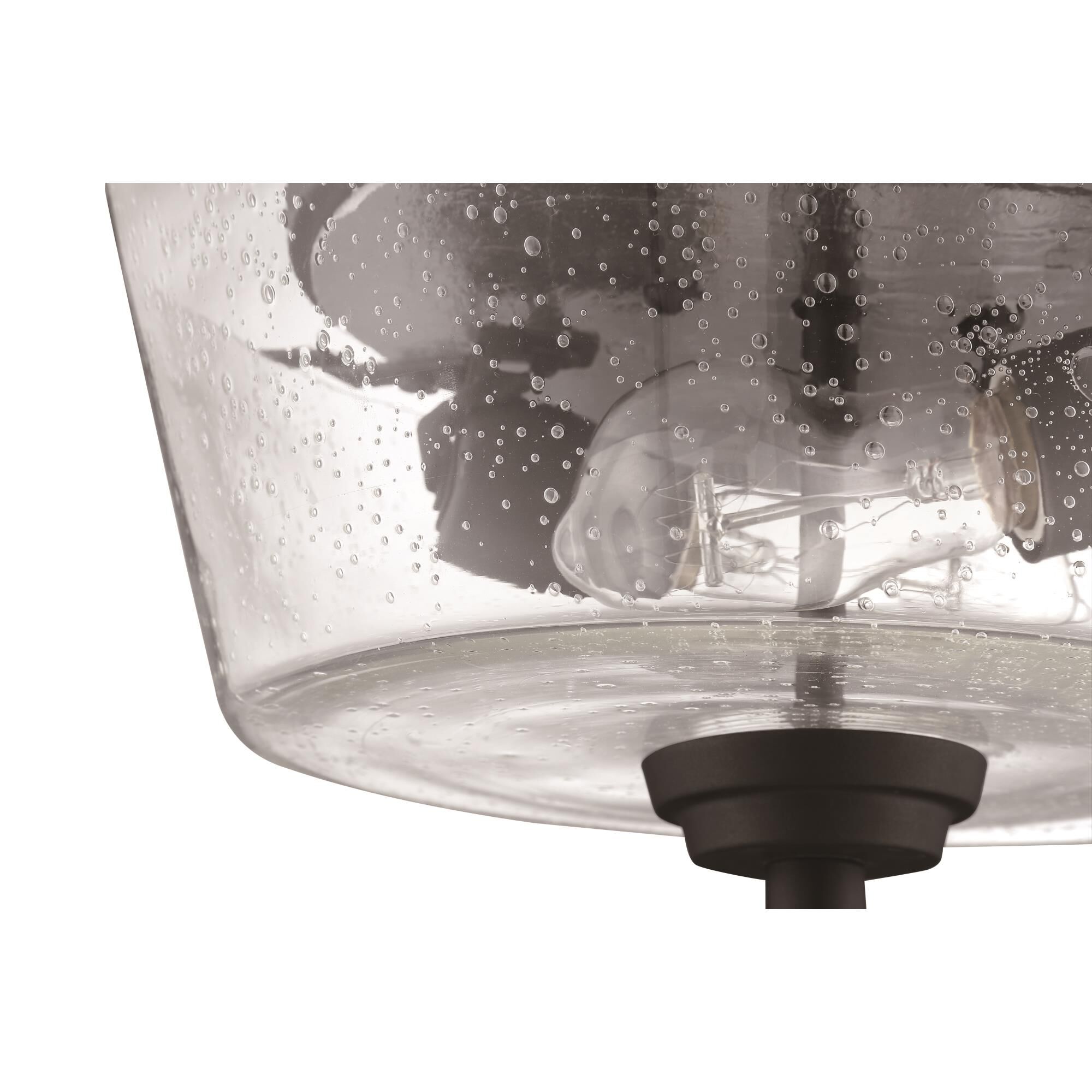 Shown in Espresso finish and Clear Seeded glass and Glass shade