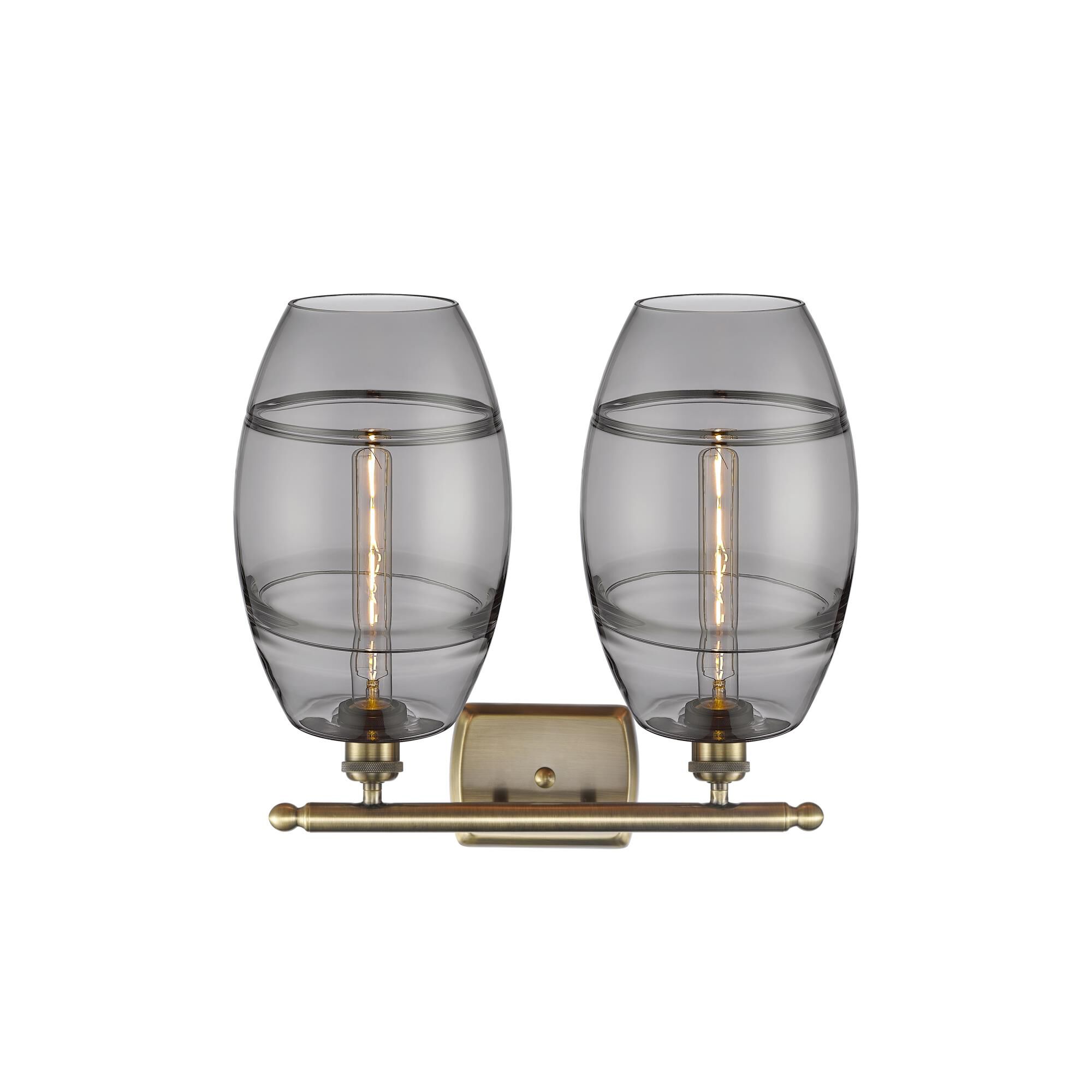 Shown in Antique Brass finish and Light Smoke glass