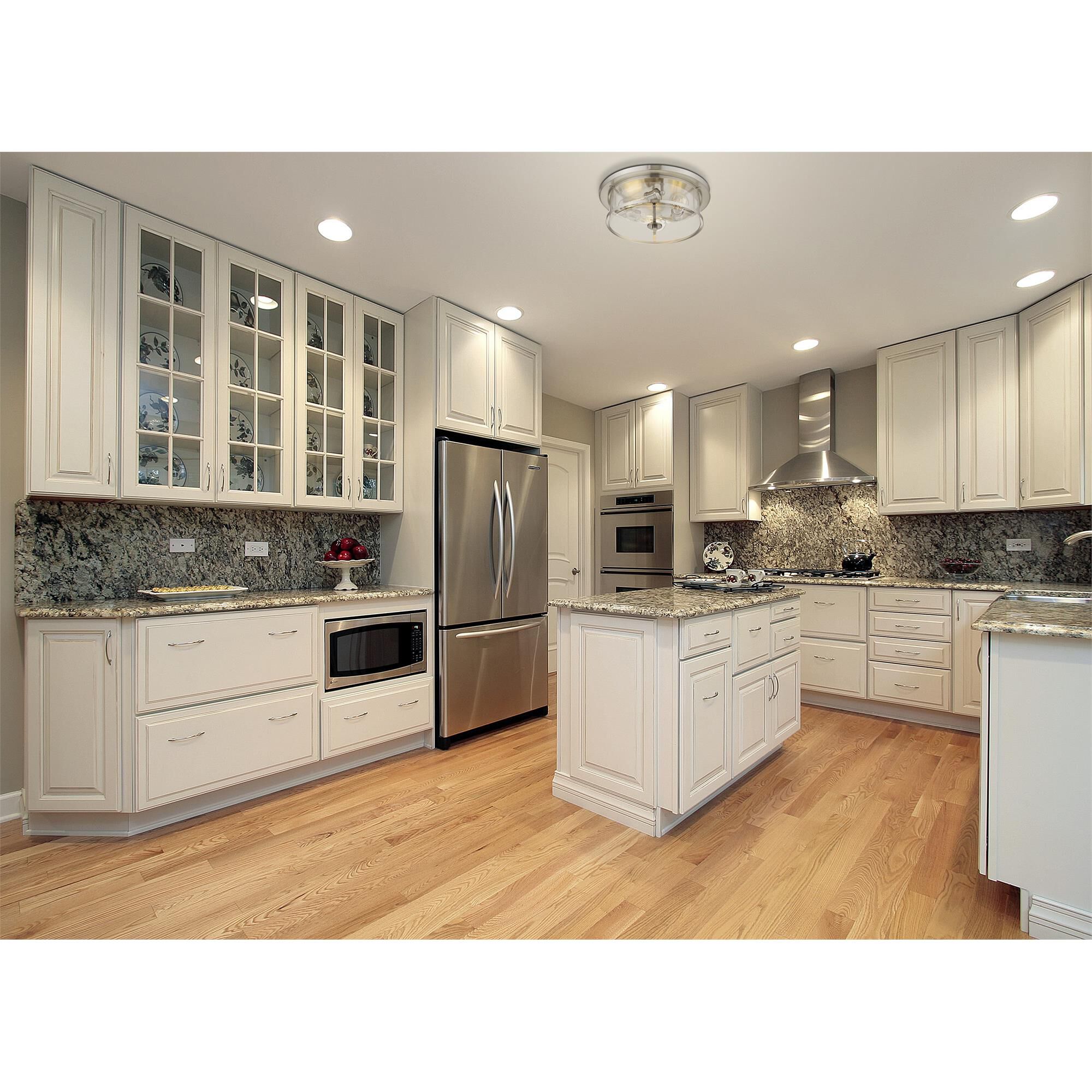Shown in Brushed Nickel finish and Glass shade