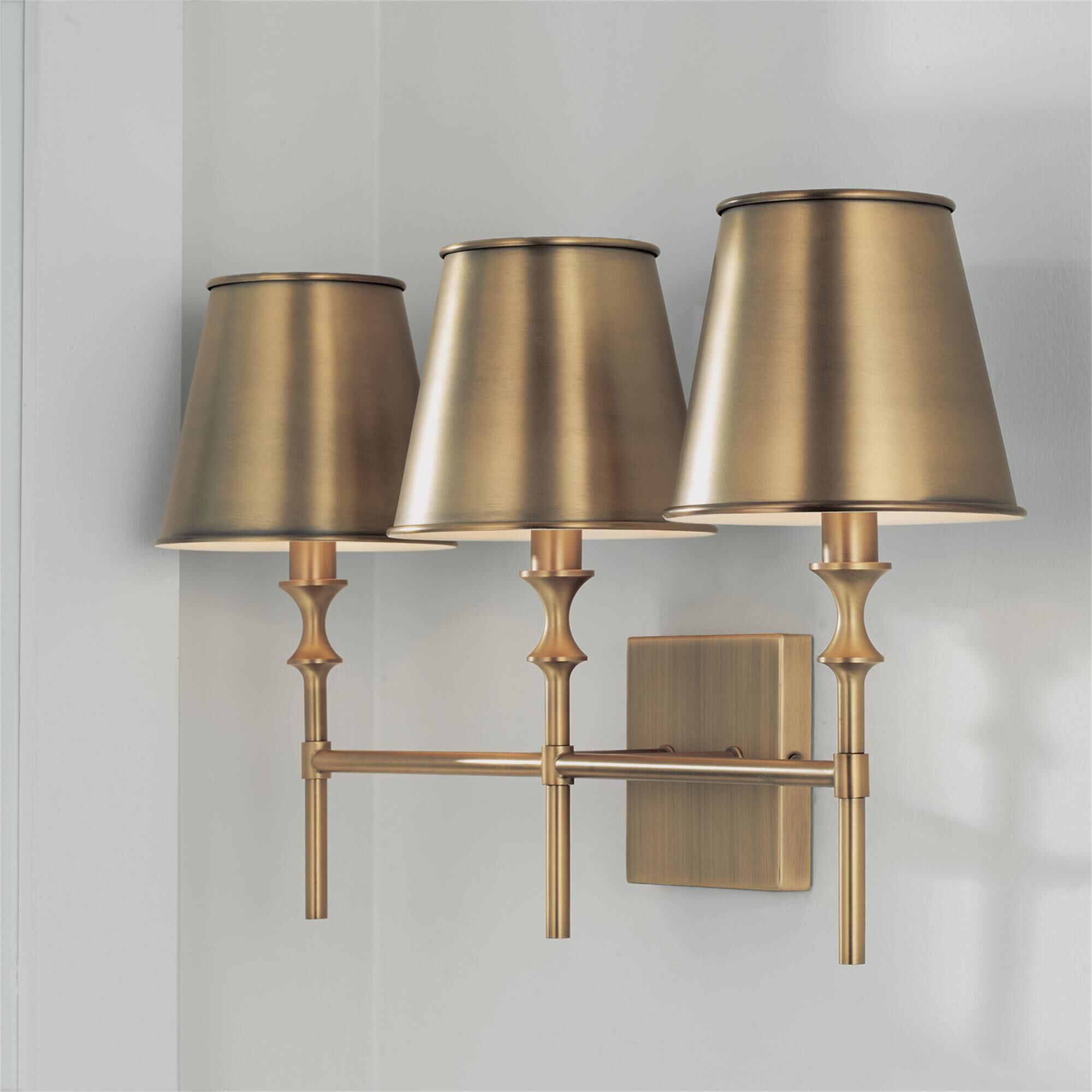 Shown in Aged Brass finish and Aged Brass Metal  with White Interior shade