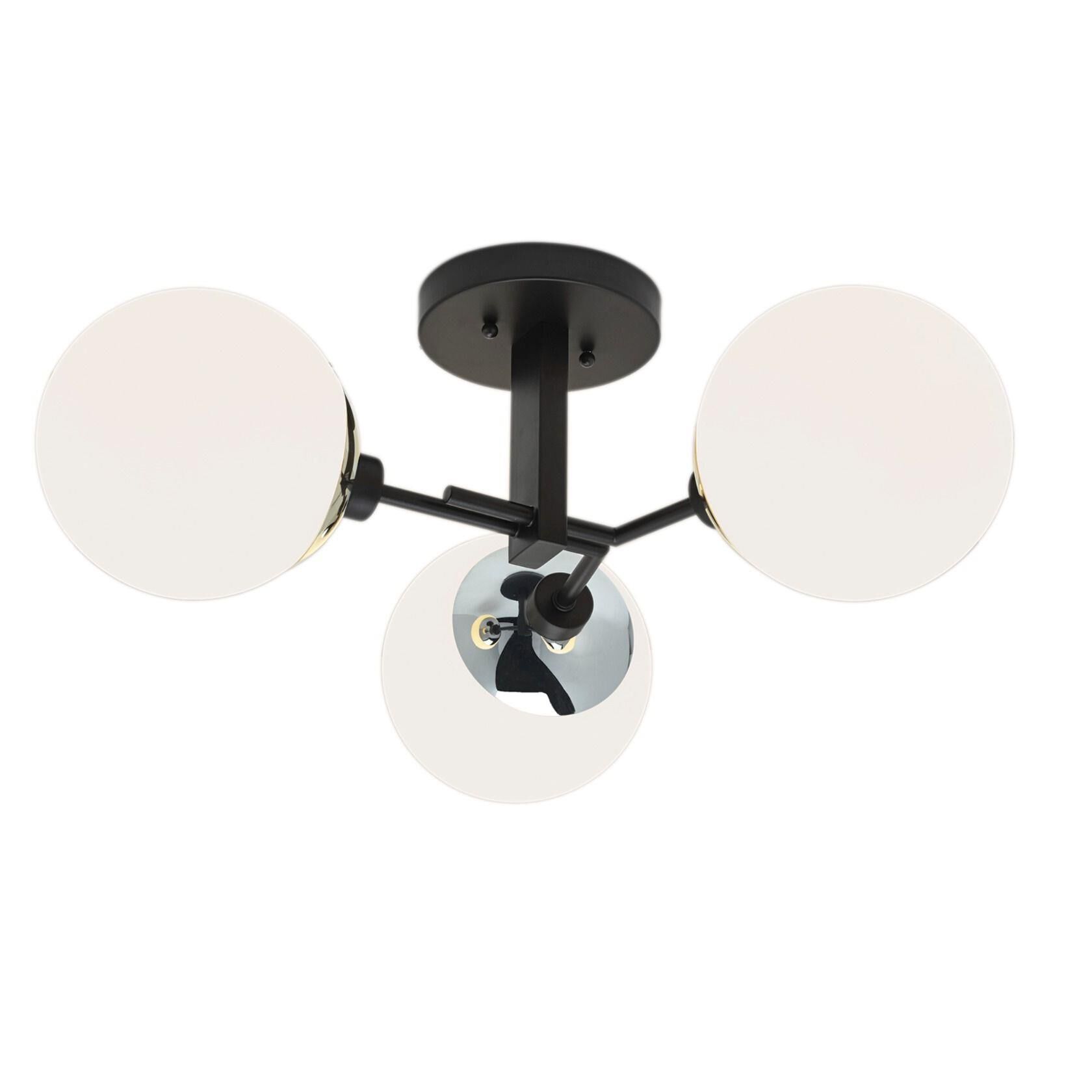 Shown in Matte Black with Polished Brass finish and Opal Globes glass