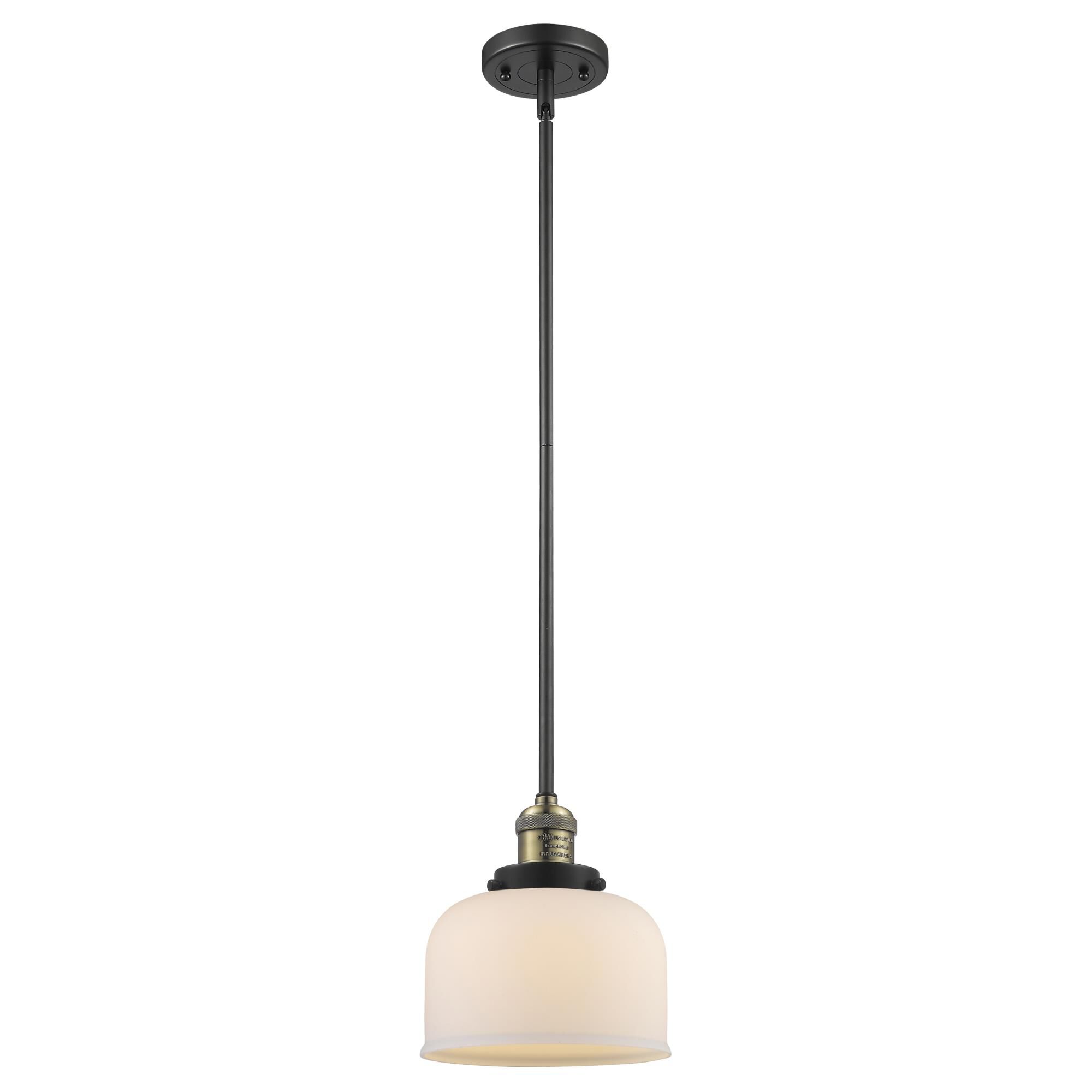 Shown in Black Antique Brass finish and Matte White Cased glass