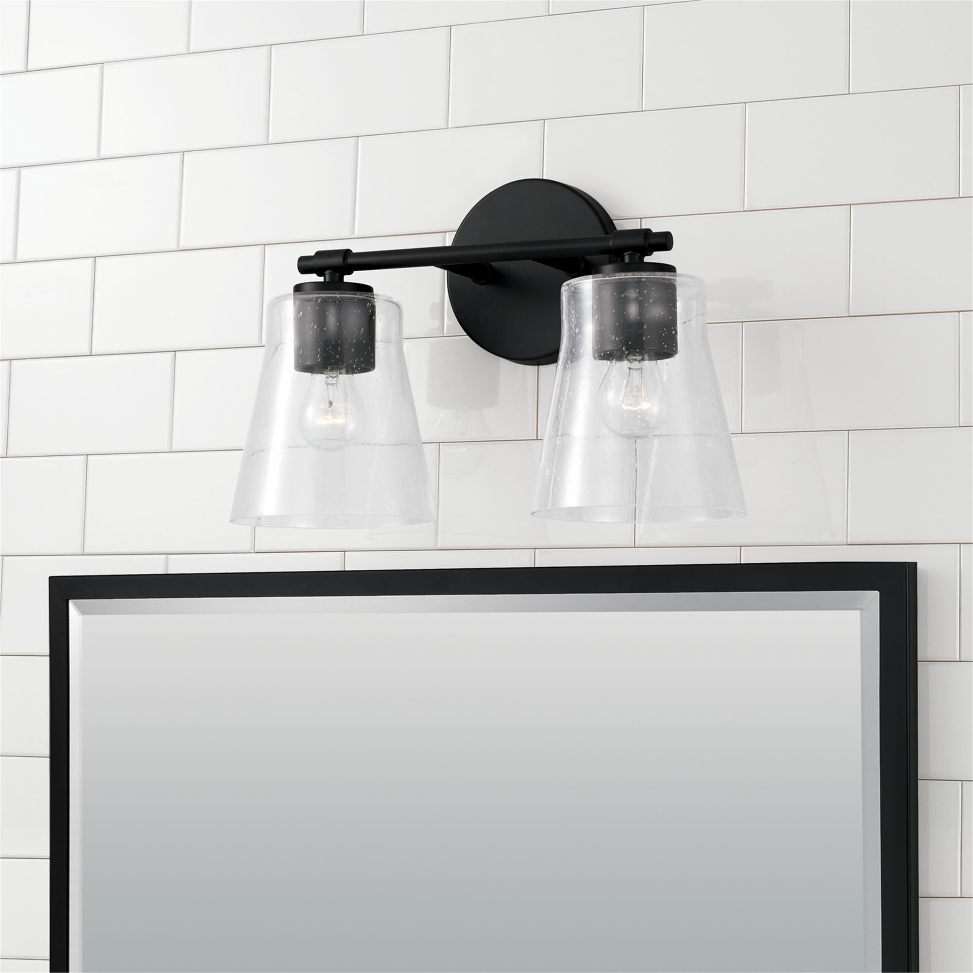 Shown in Matte Black finish and Clear Seeded glass