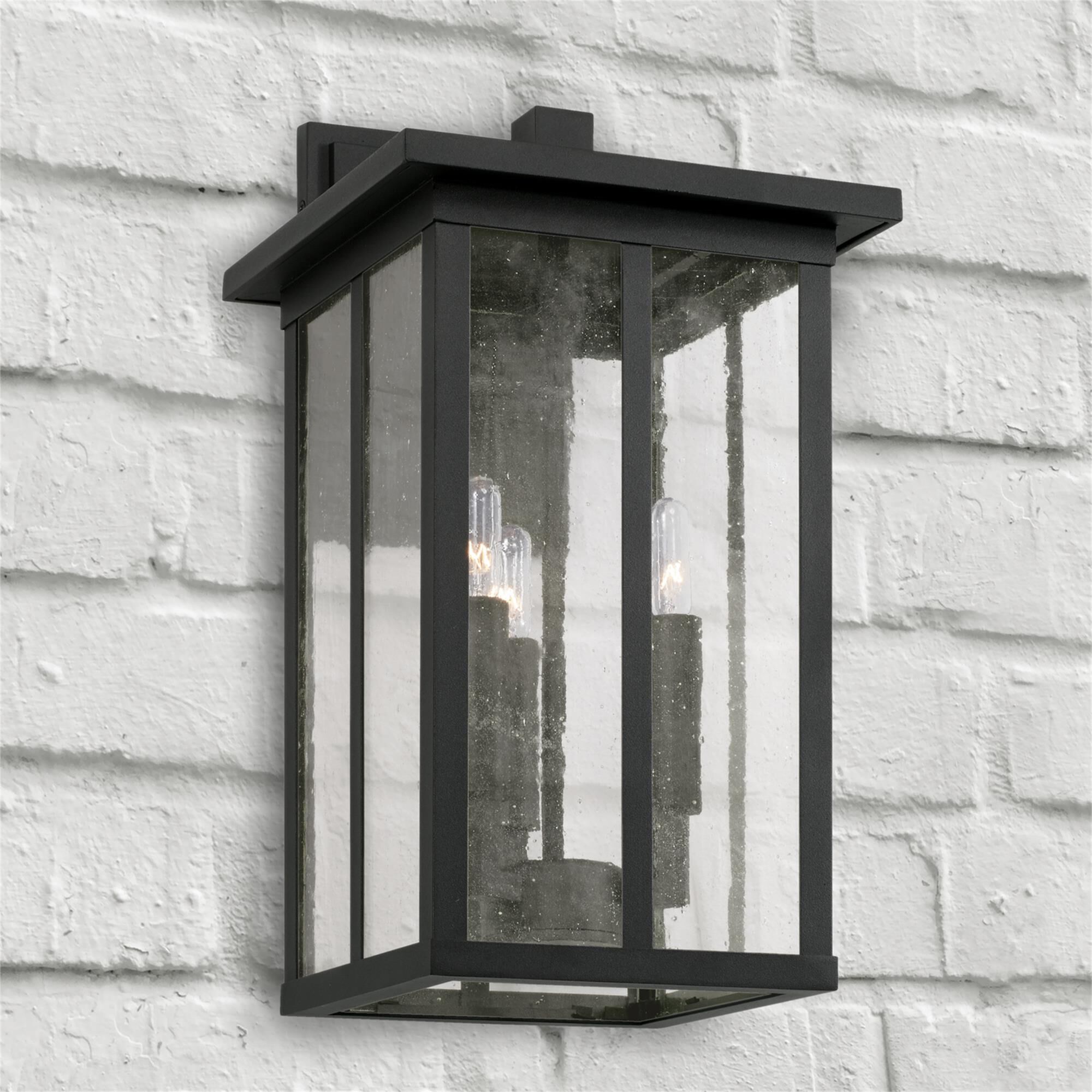 Shown in Black finish and Antiqued glass