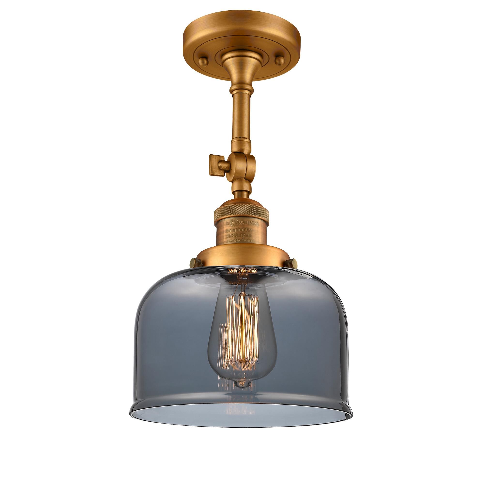Shown in Brushed Brass finish and Plated Smoked glass and None accent