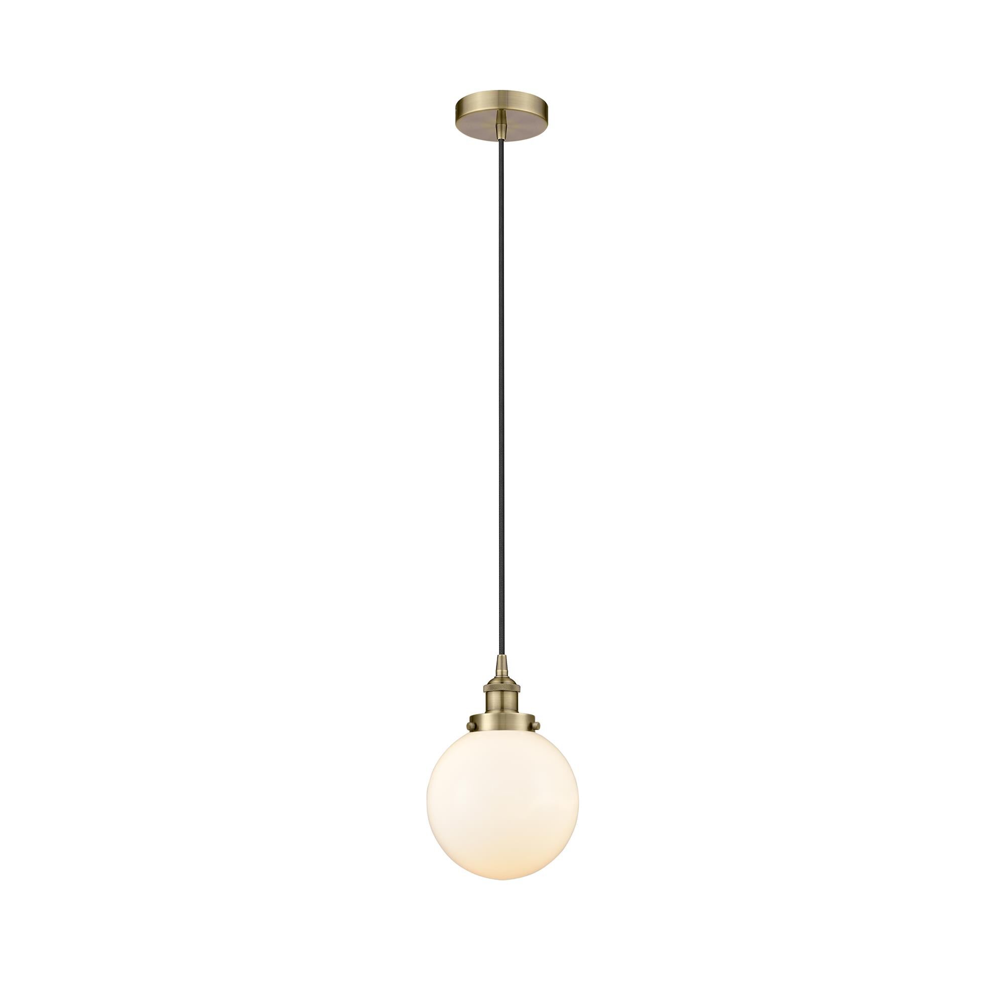 Shown in Antique Brass finish and Matte White Cased Beacon glass