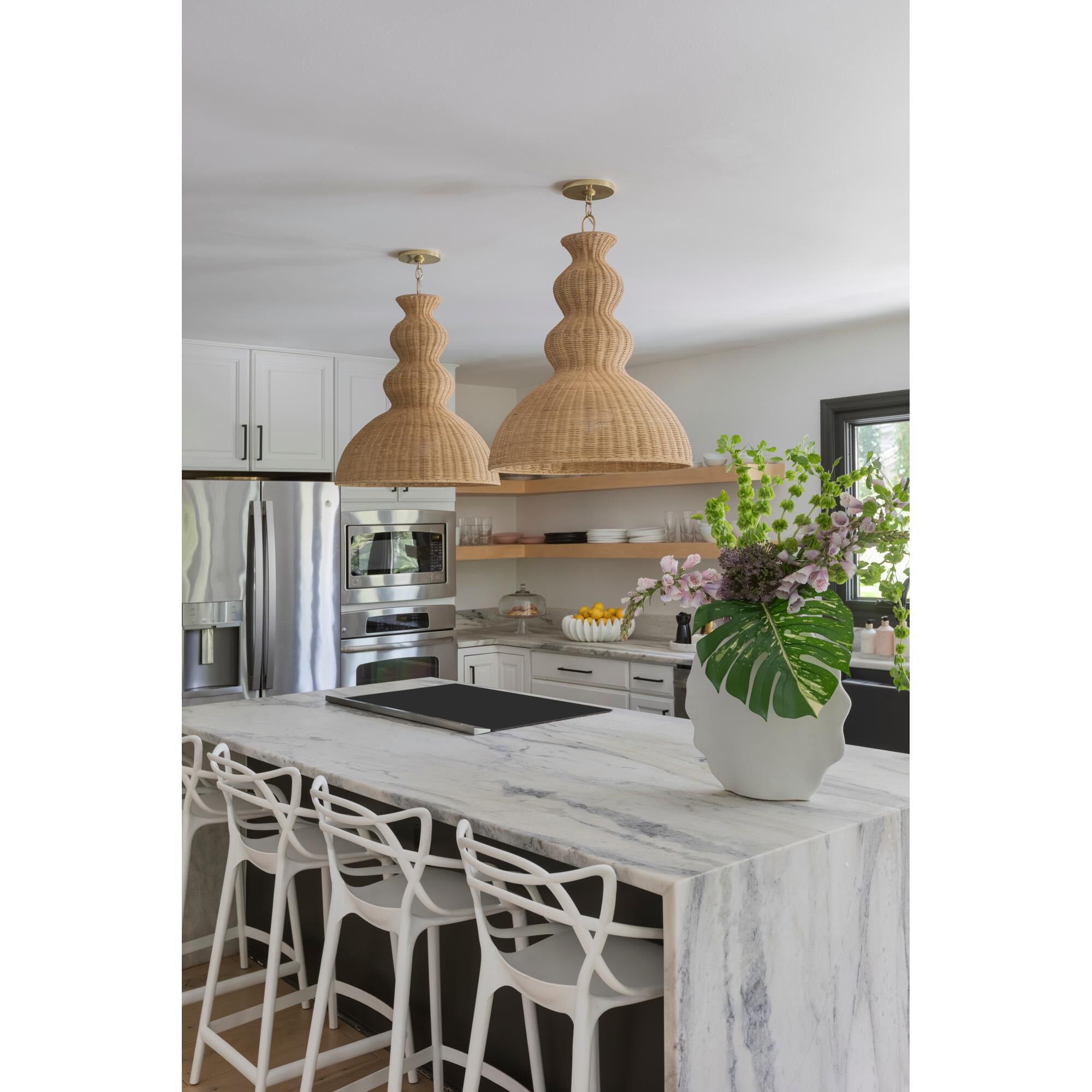 Shown in Aged Brass finish and Natural Woven shade