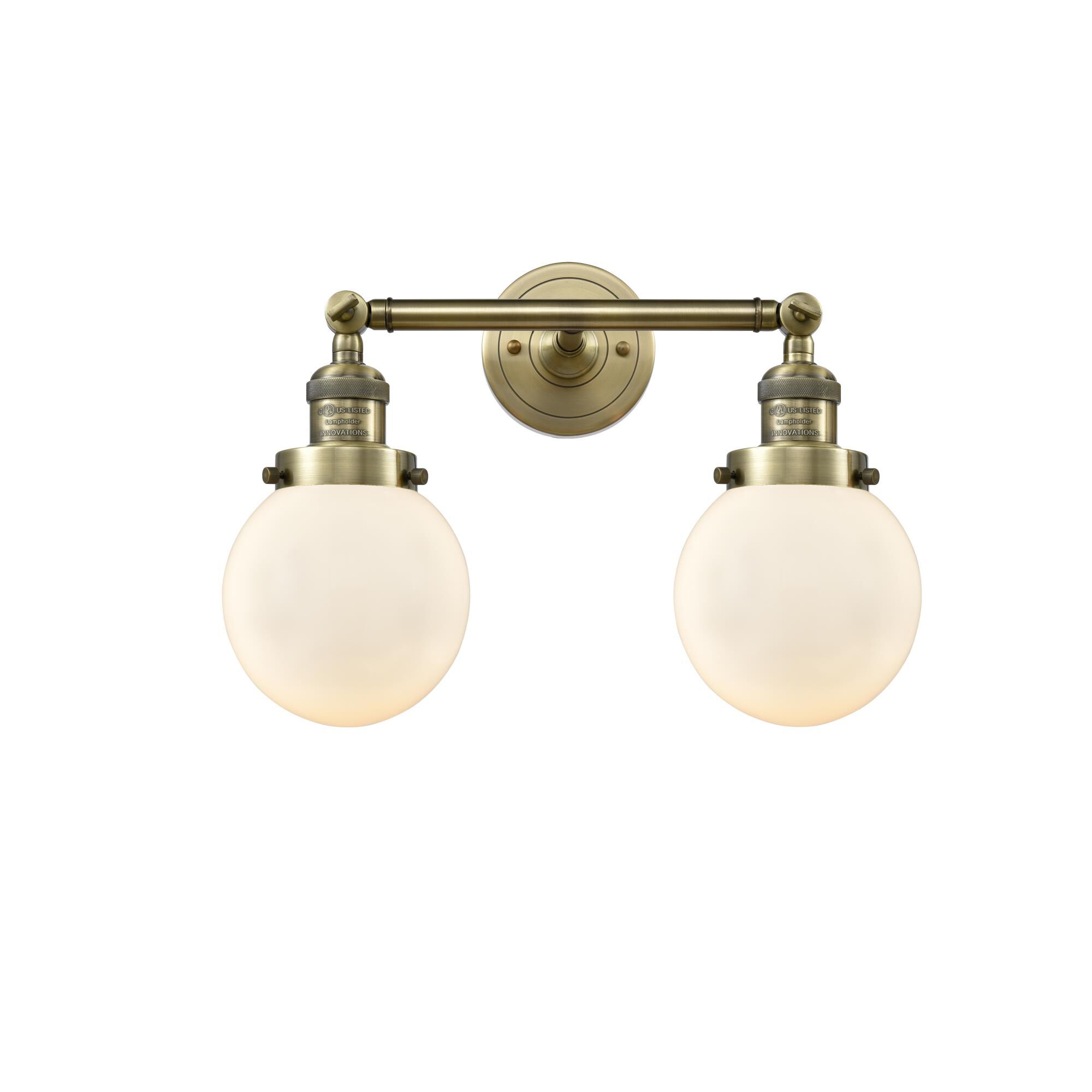 Shown in Antique Brass finish and Matte White Cased glass