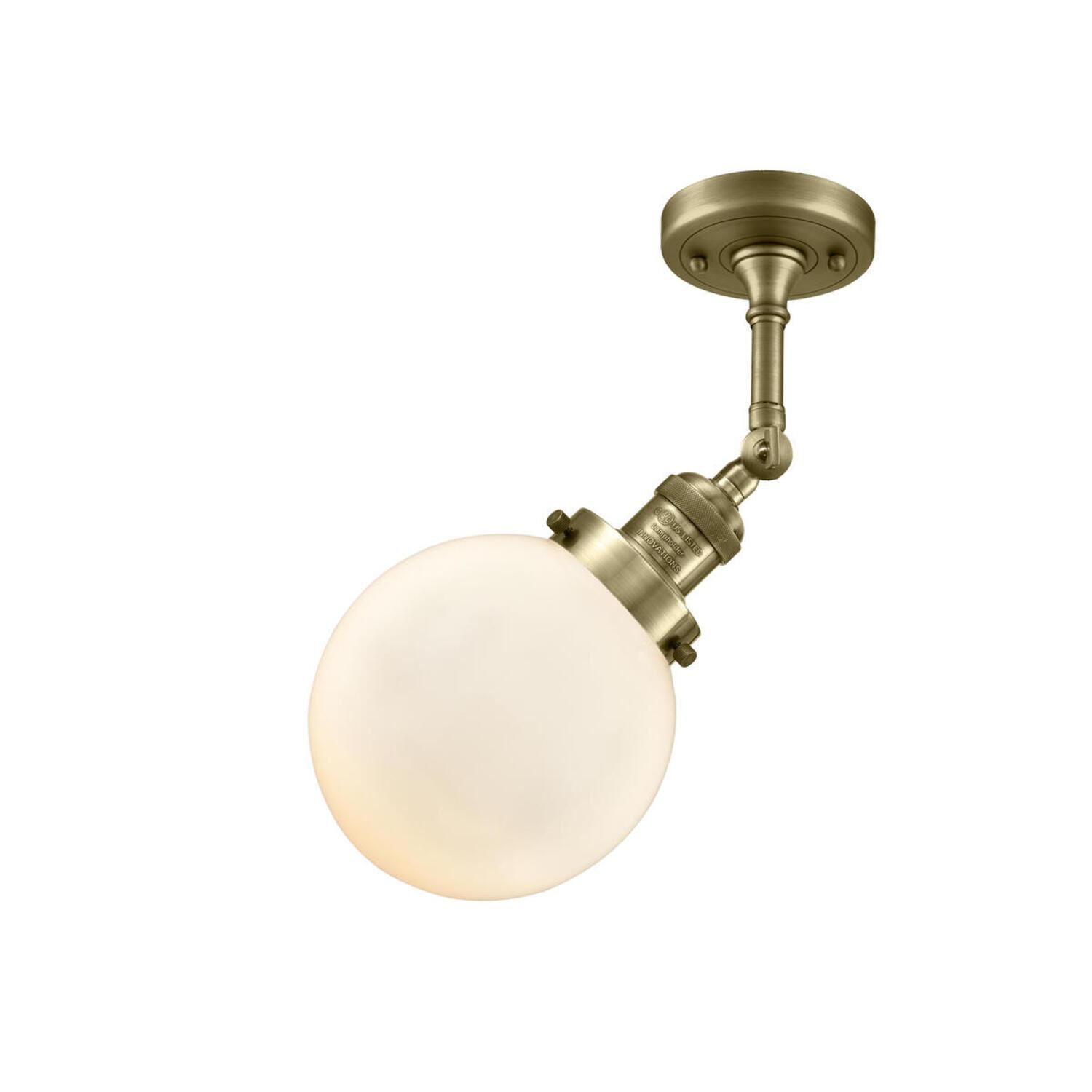 Shown in Antique Brass finish and Matte White Cased glass and No Accent accent