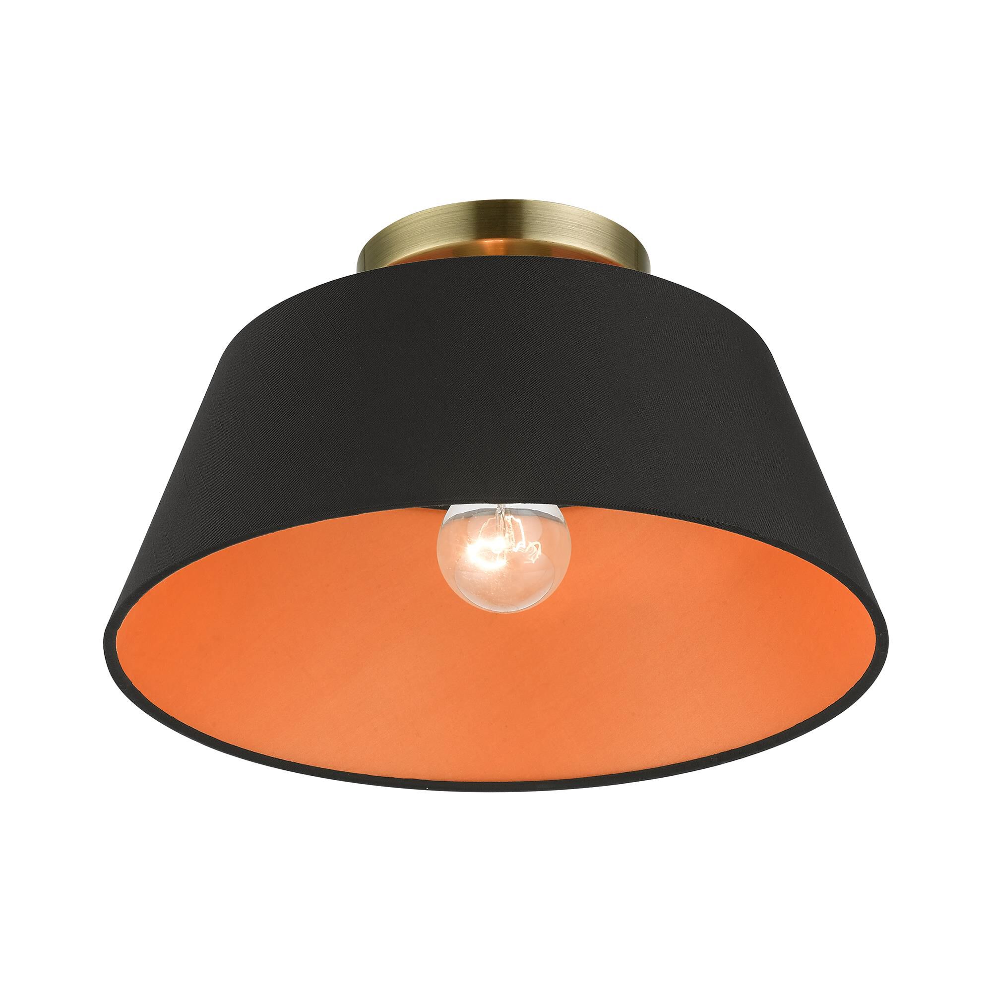 Shown in Antique Brass finish and Black Fabric Hardback with Orange Fabric Inside shade