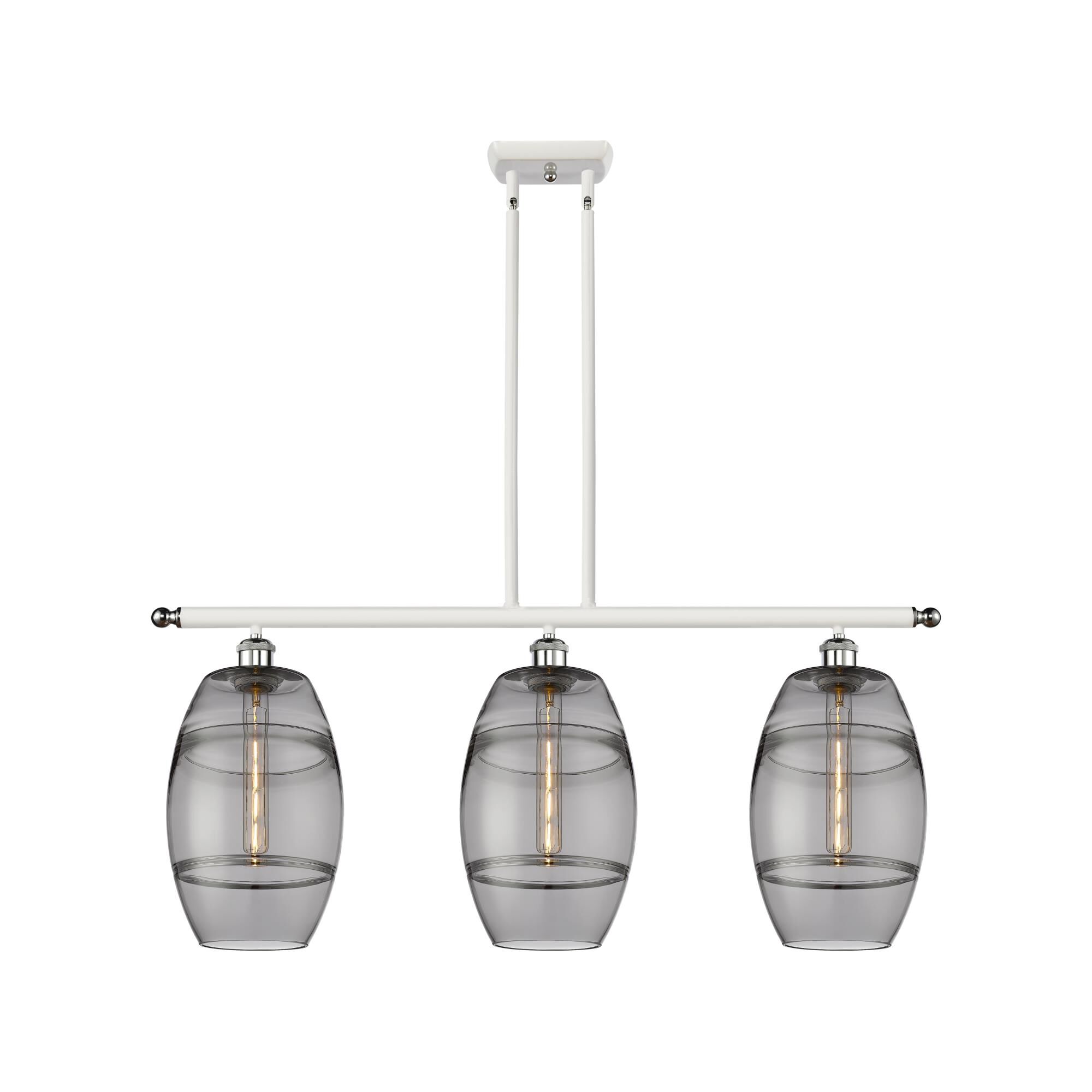 Shown in White Polished Chrome finish and Light Smoke glass