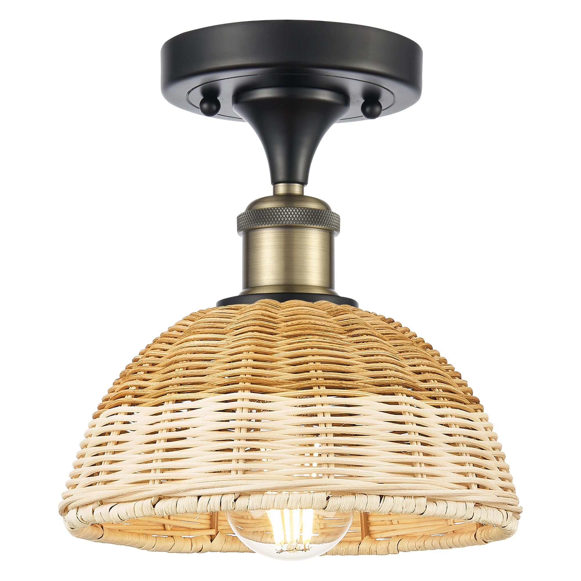 Shown in Black Antique Brass finish and Natural shade