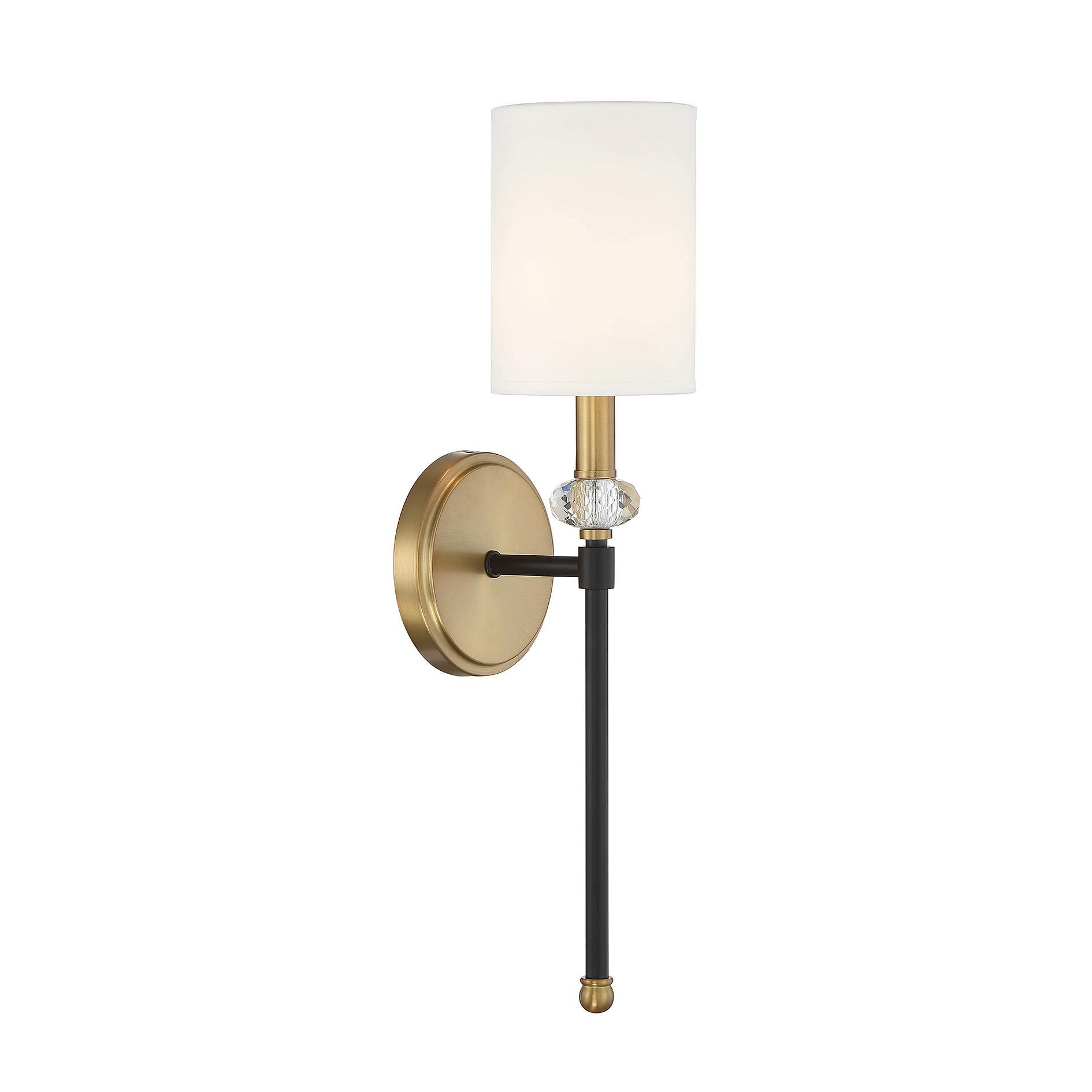 Shown in Matte Black With Warm Brass Accents finish and Clear Accents crystal and White Fabric shade