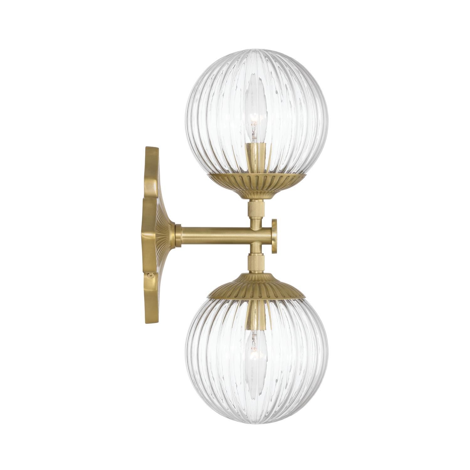 Shown in Aged Brass finish and Ribbed glass and Ribbed Glass shade