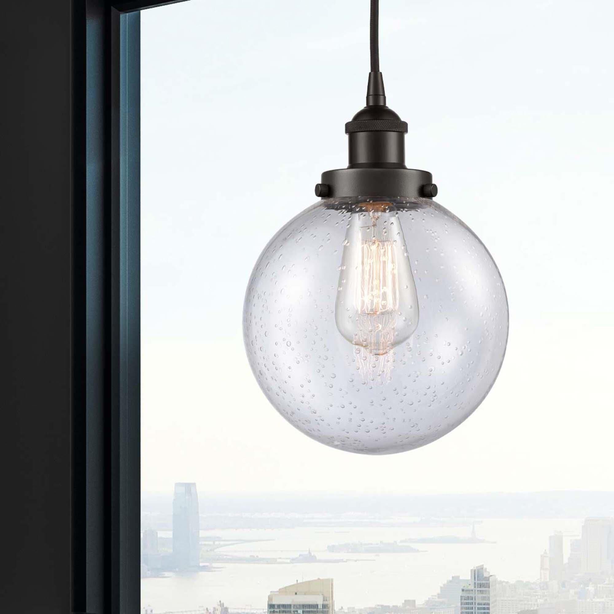 Shown in Oil Rubbed Bronze finish and Seedy Beacon glass