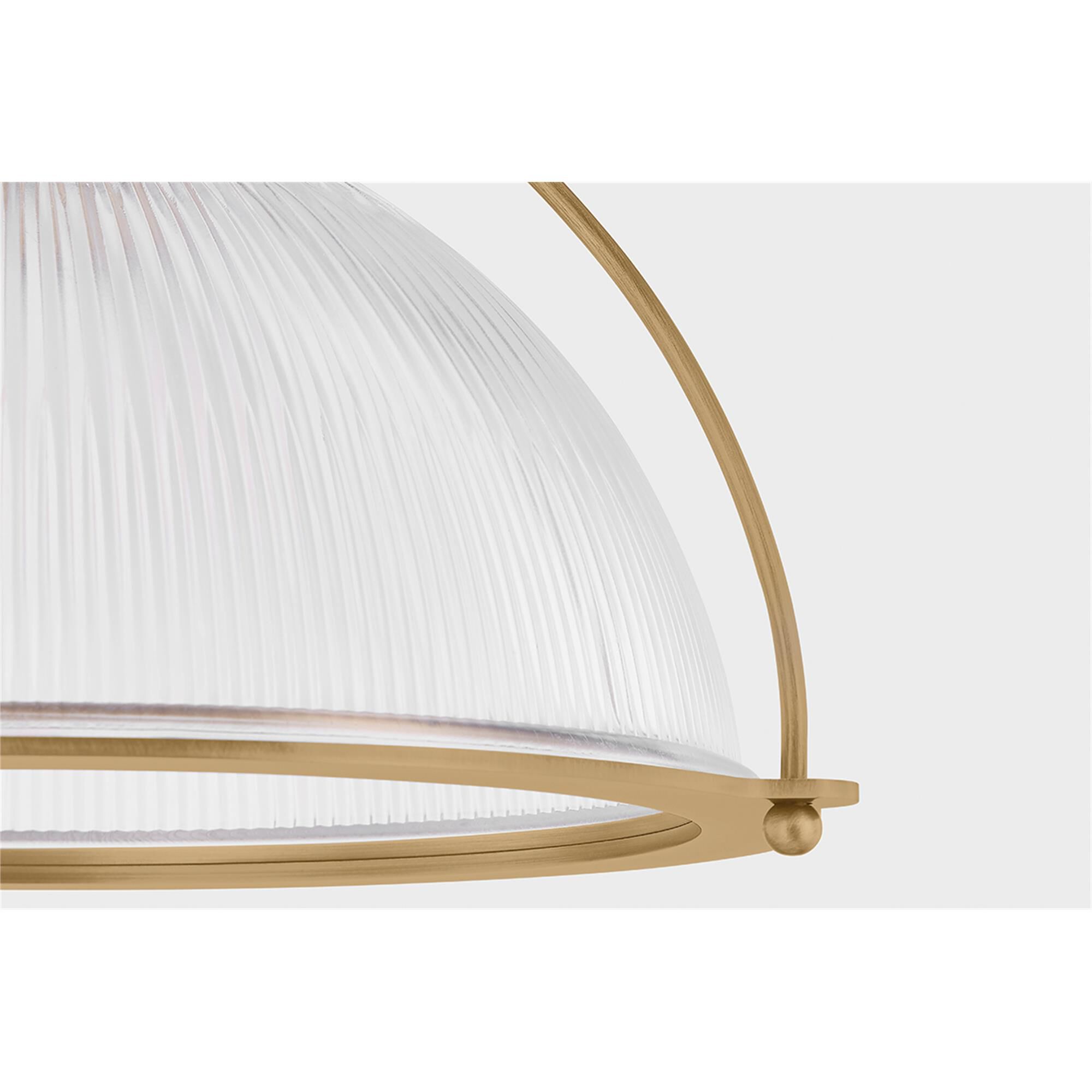 Shown in Patina Brass finish and Holophane glass