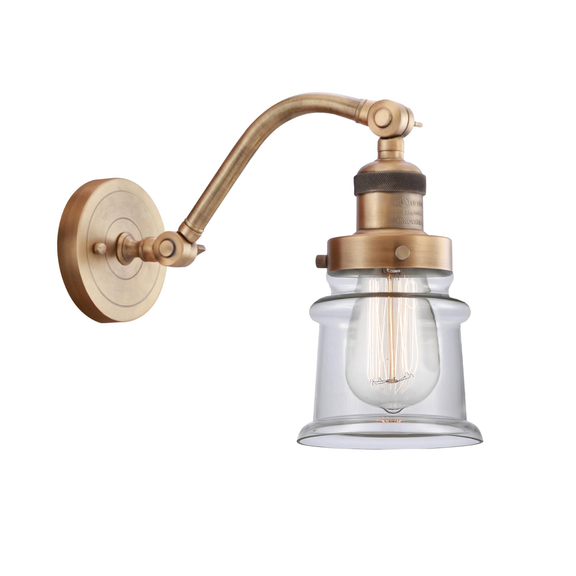 Shown in Brushed Brass finish and Clear Canton glass