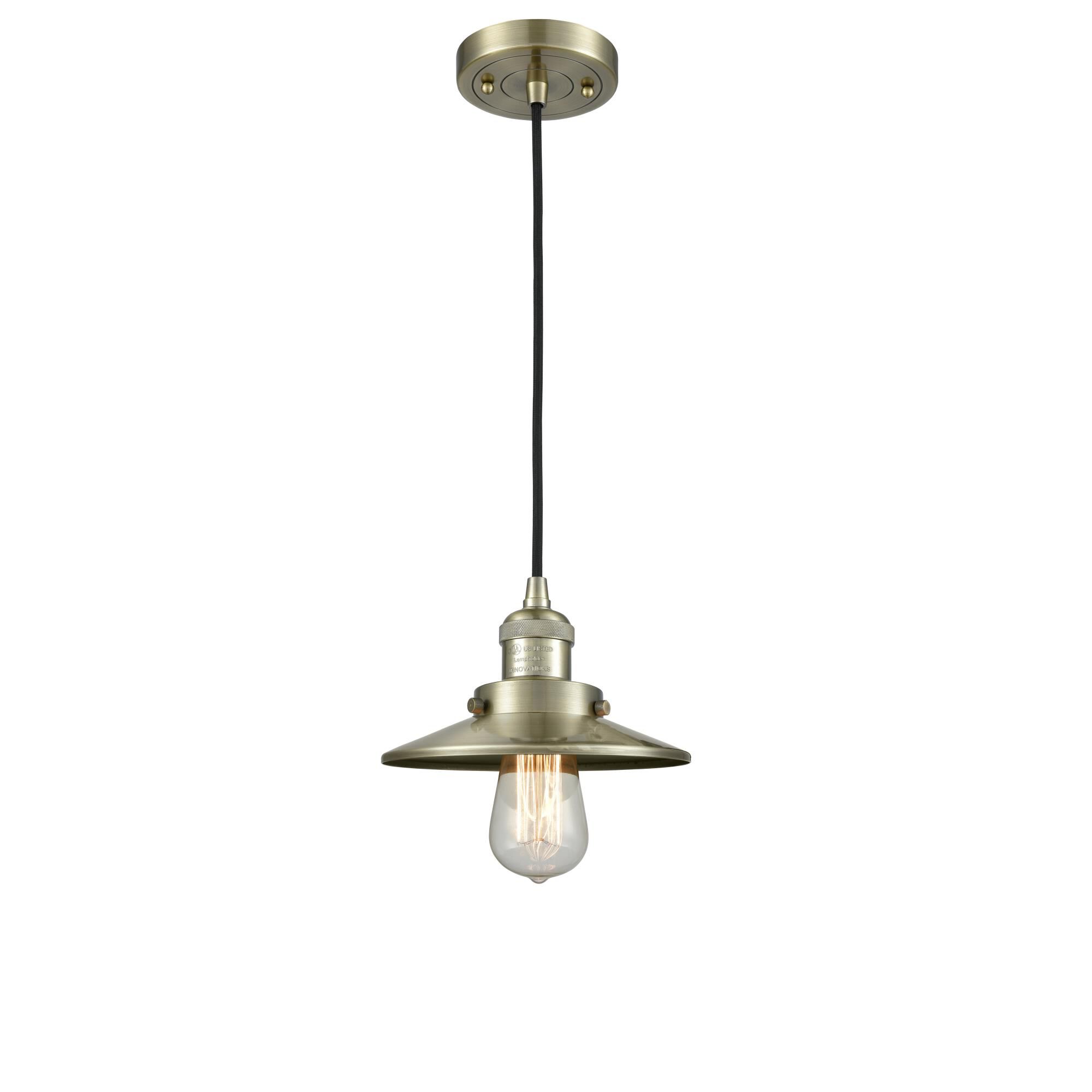 Shown in Antique Brass finish and Metal - Antique Brass - Cone shade and Black Textured Cord accent