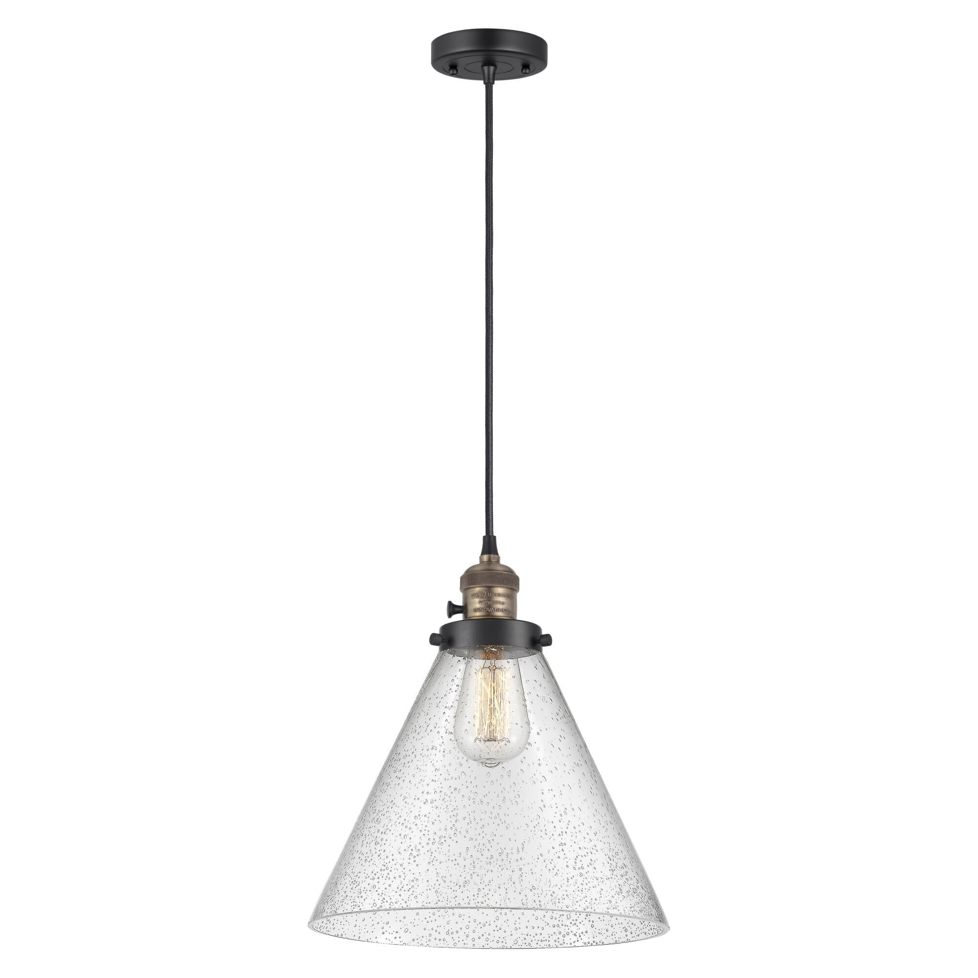 Shown in Black Antique Brass finish and Seedy glass