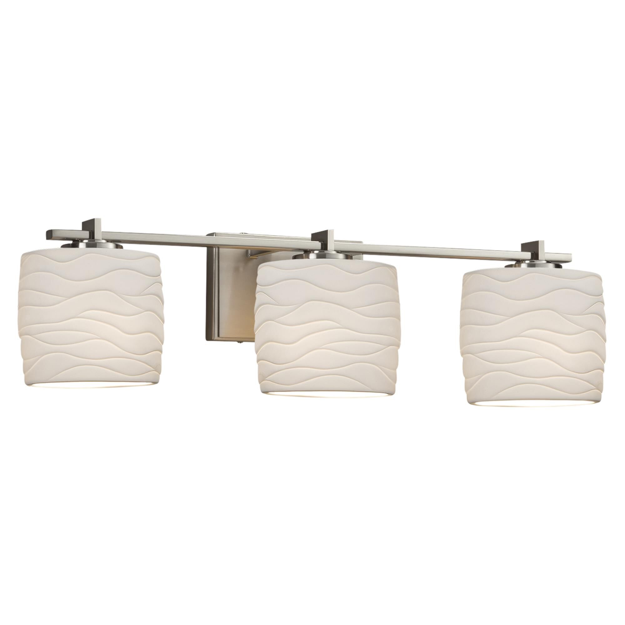 Shown in Brushed Nickel finish and Translucent Porcelain glass and Waves shade and Oval accent