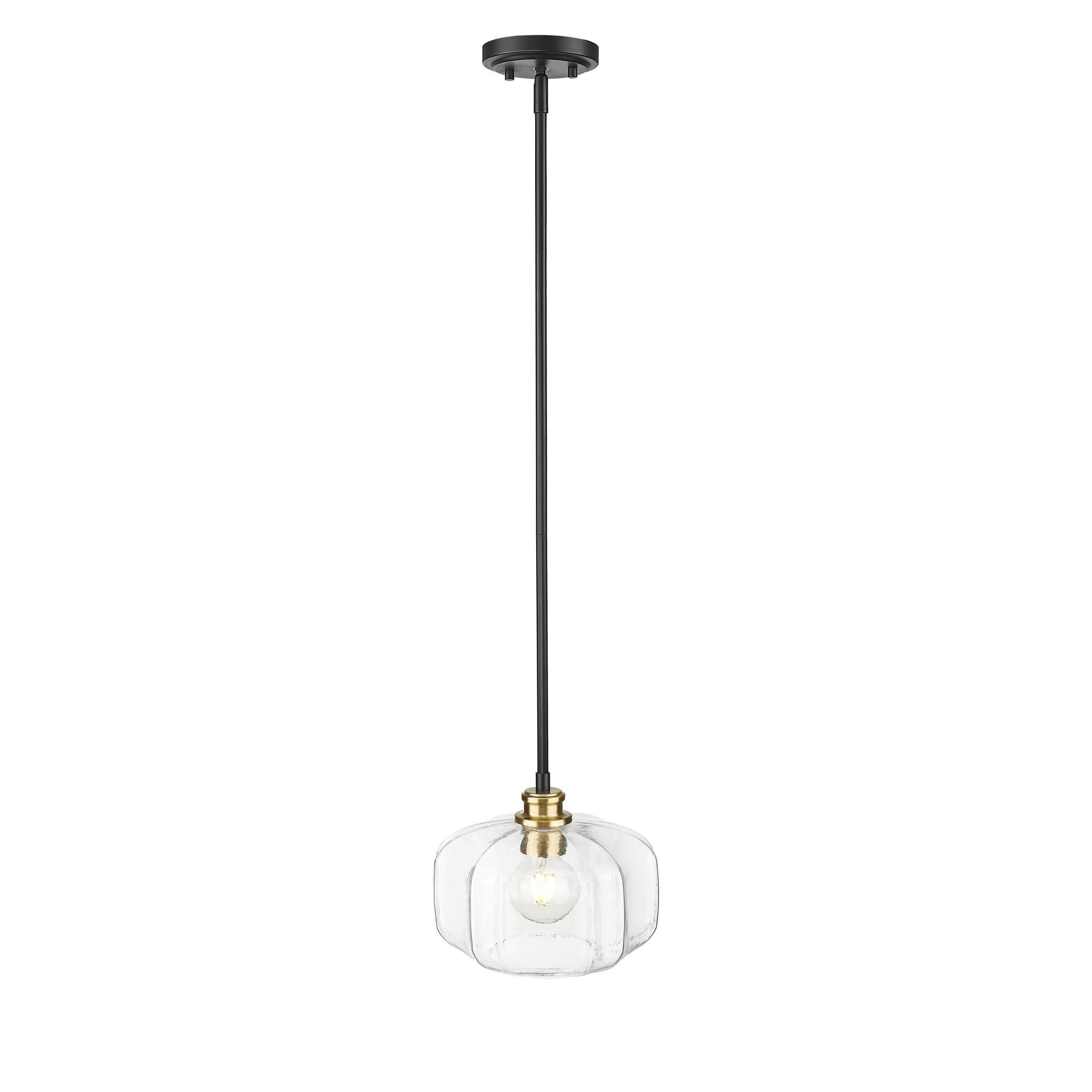 Shown in Matte Black And Brass finish and Clear Glass Globe shade