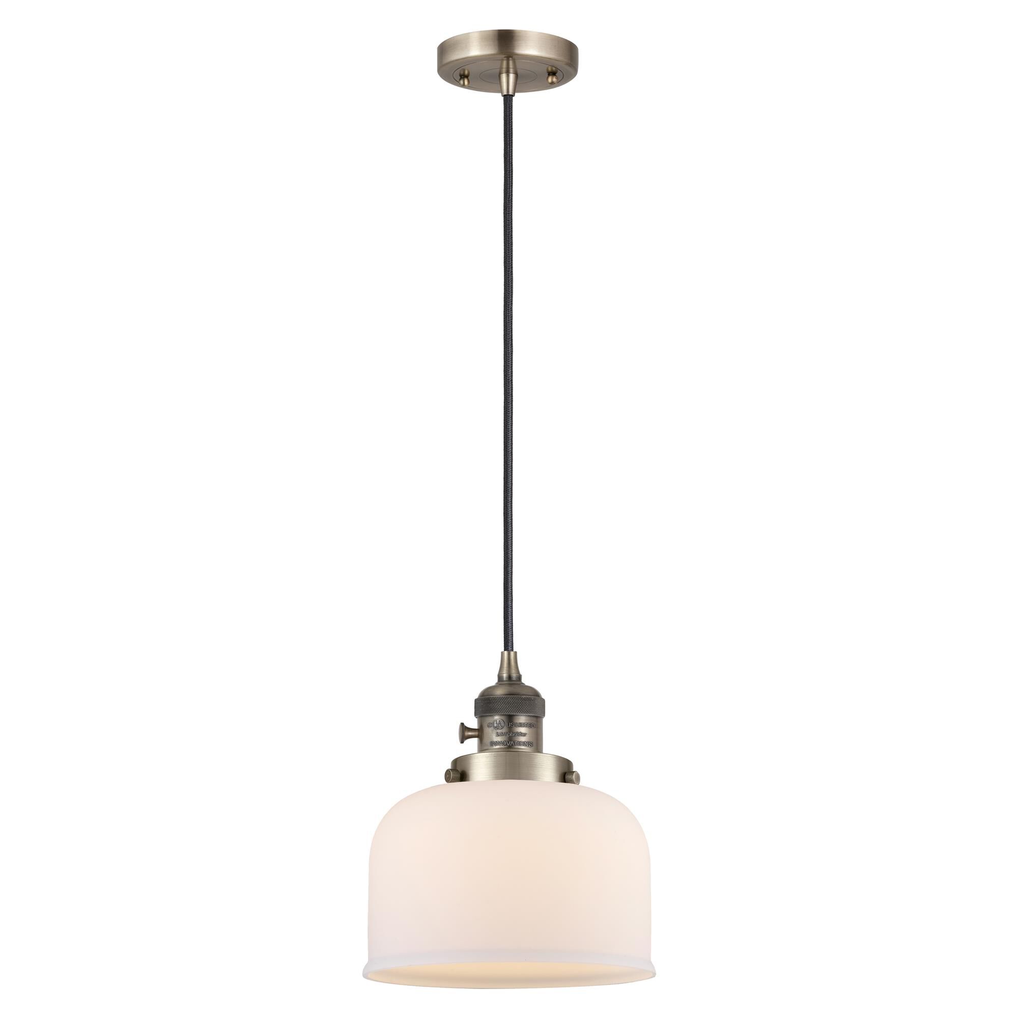 Shown in Antique Brass finish and Matte White glass