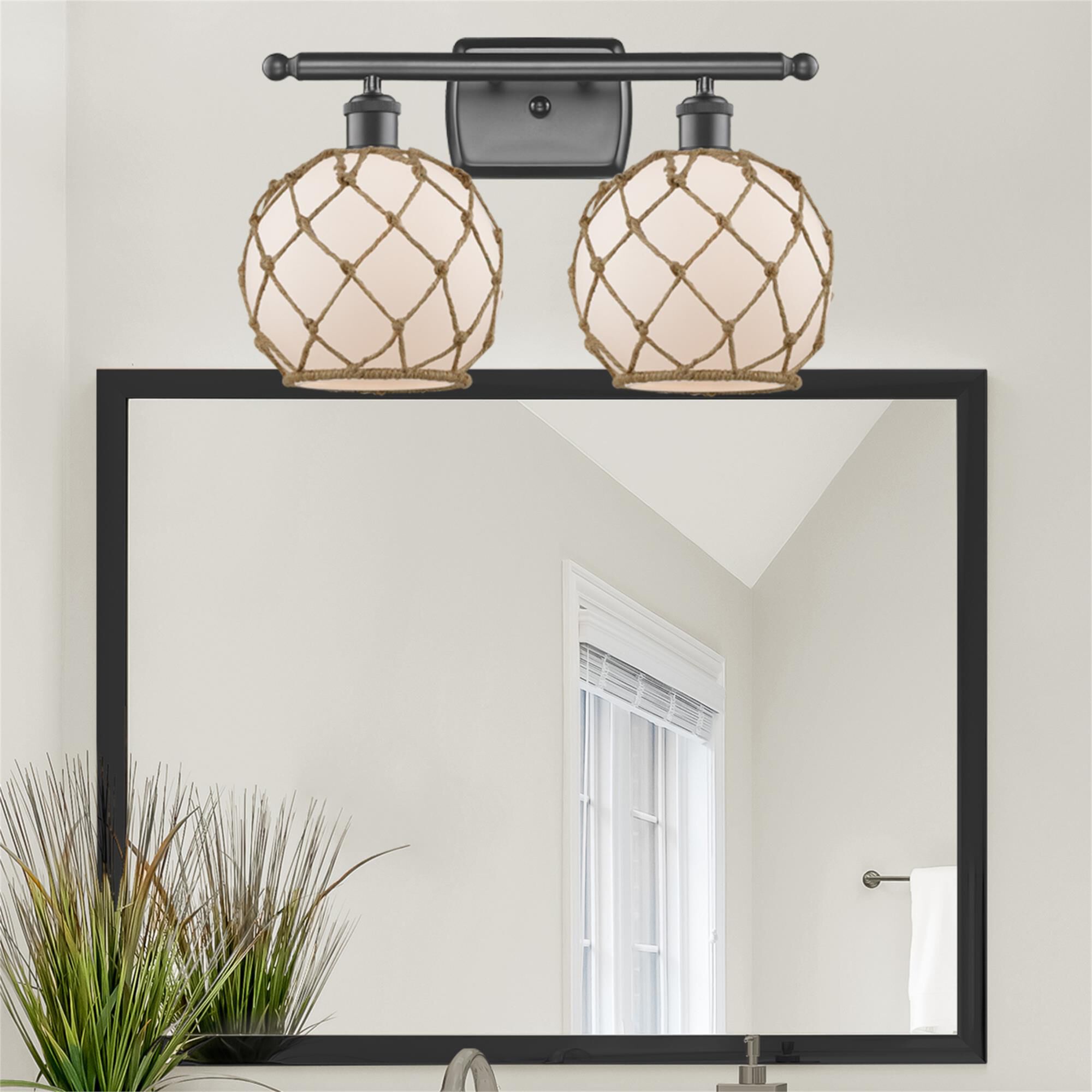 Shown in Oil Rubbed Bronze finish and White glass and Brown Rope accent