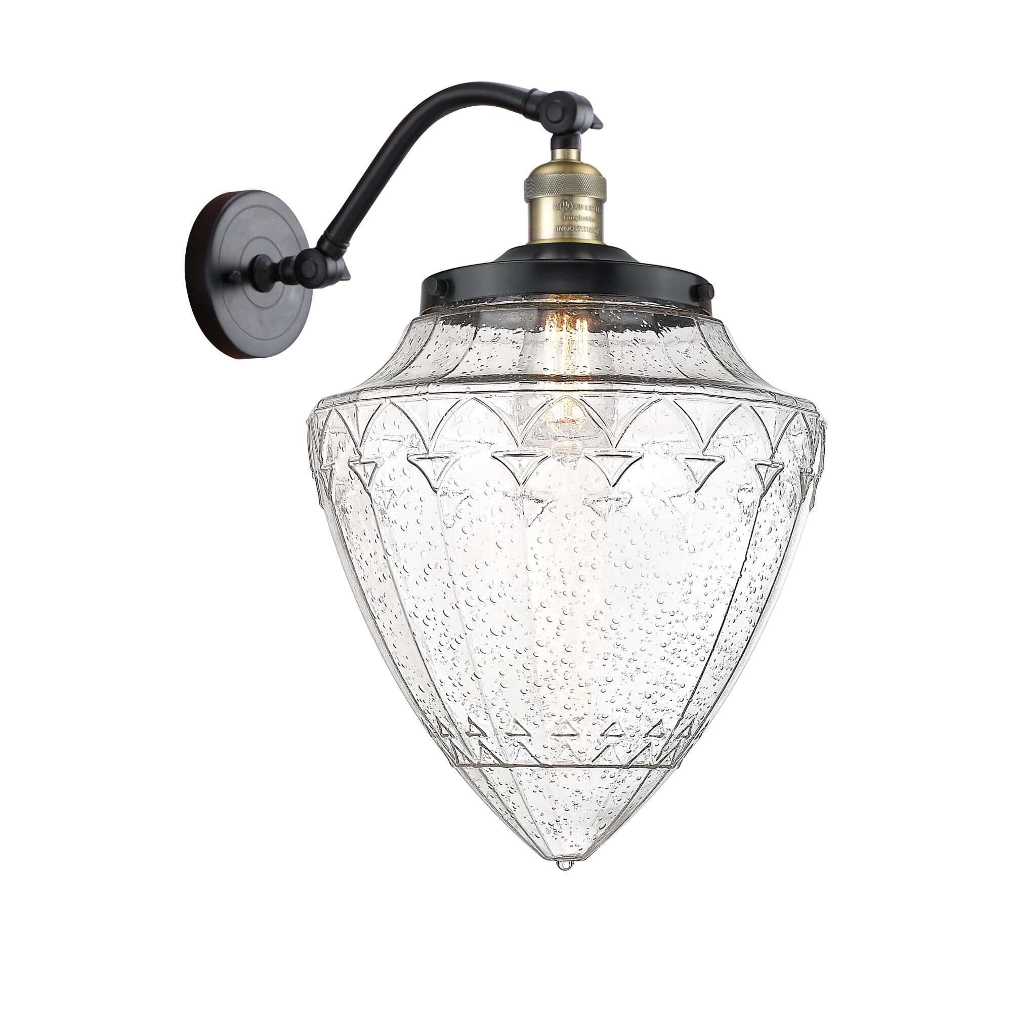 Shown in Black Antique Brass finish and Seedy glass
