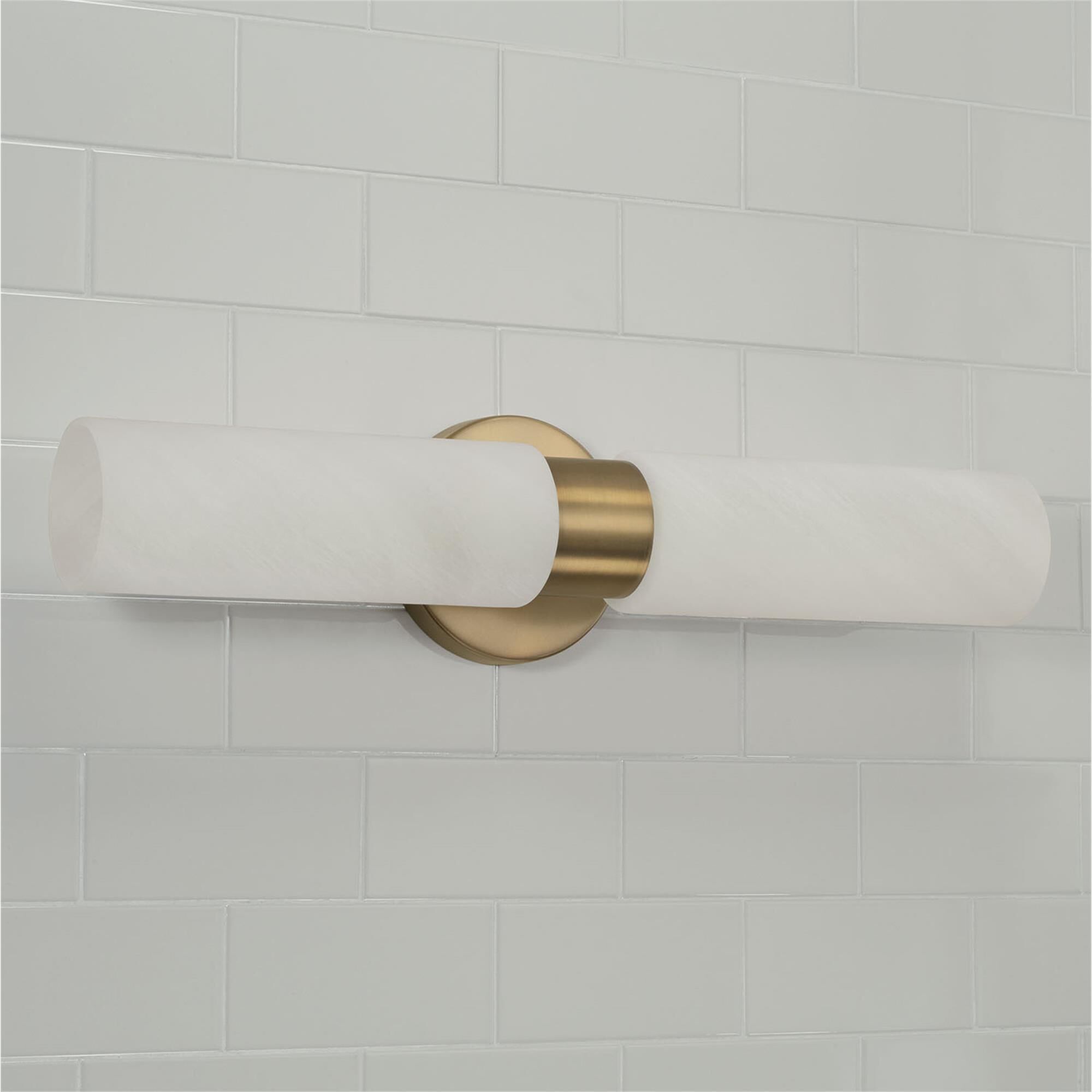 Shown in Aged Brass finish and Faux Alabaster glass