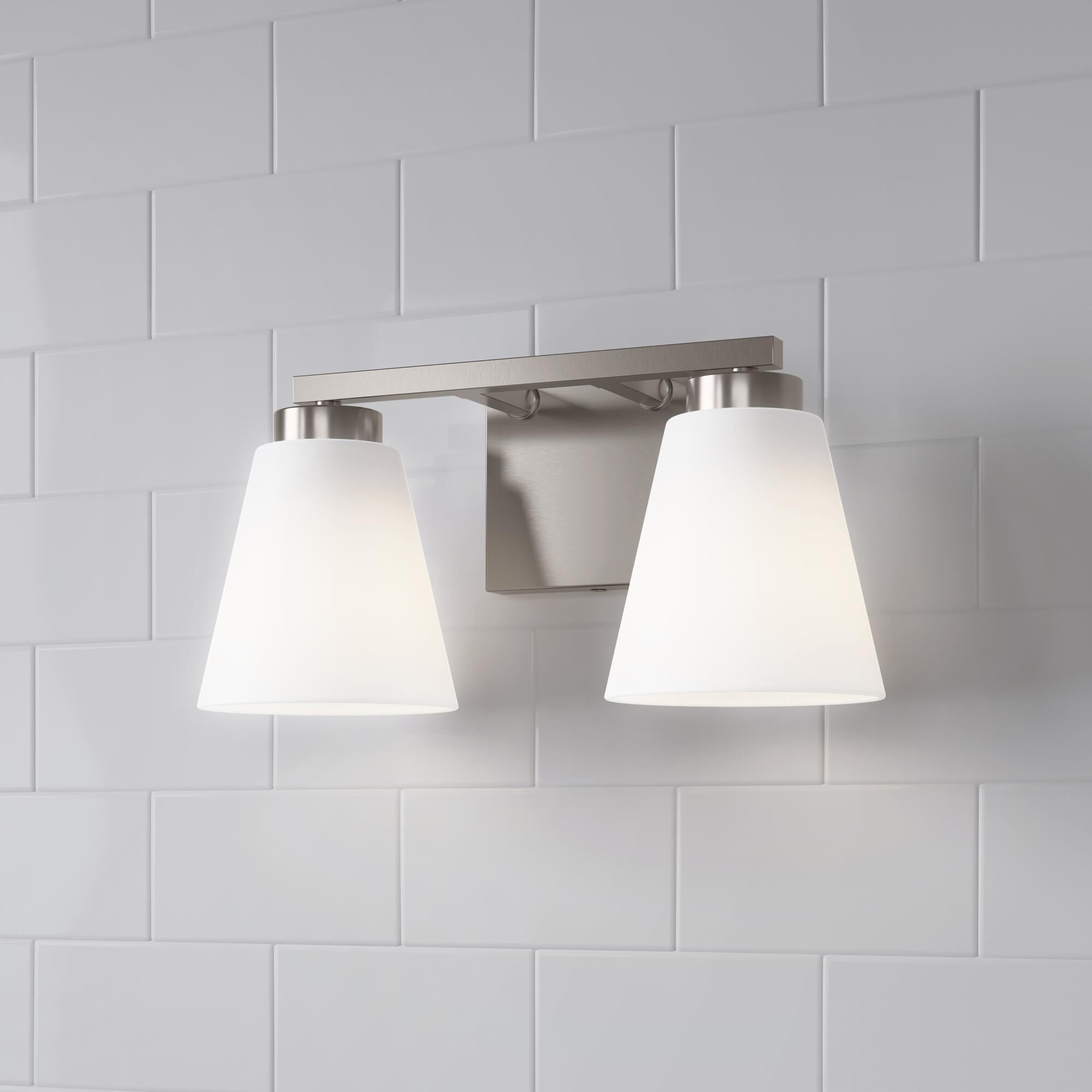 Shown in Brushed Nickel finish and White Frosted glass