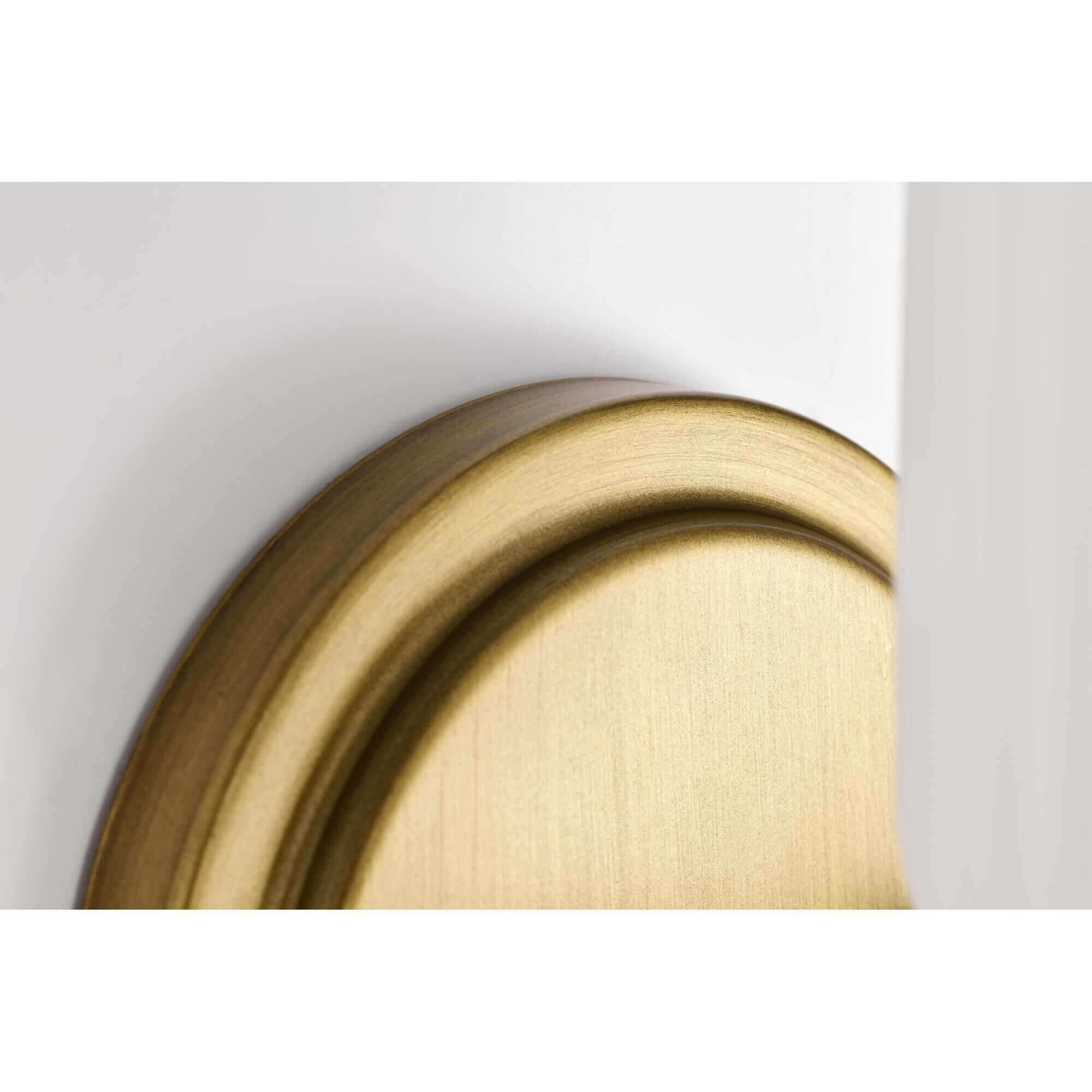 Shown in Natural Brass finish and Frosted Ribbed glass