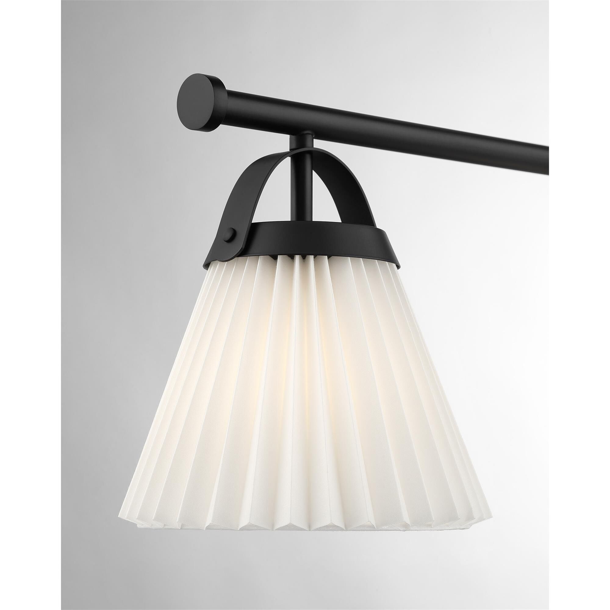 Shown in Matte Black finish and White Knife Pleated Fabric shade
