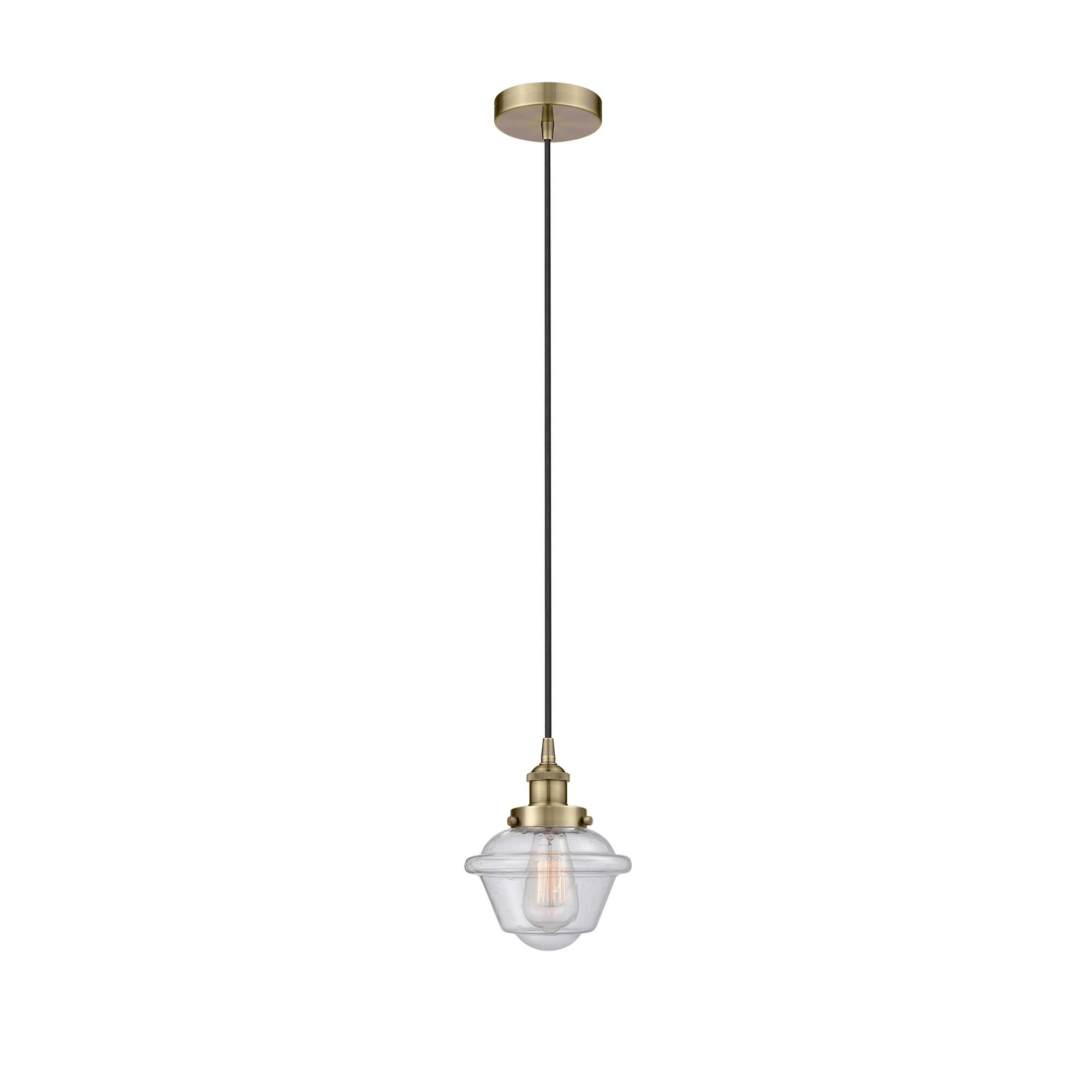 Shown in Antique Brass finish and Seedy Small Oxford glass