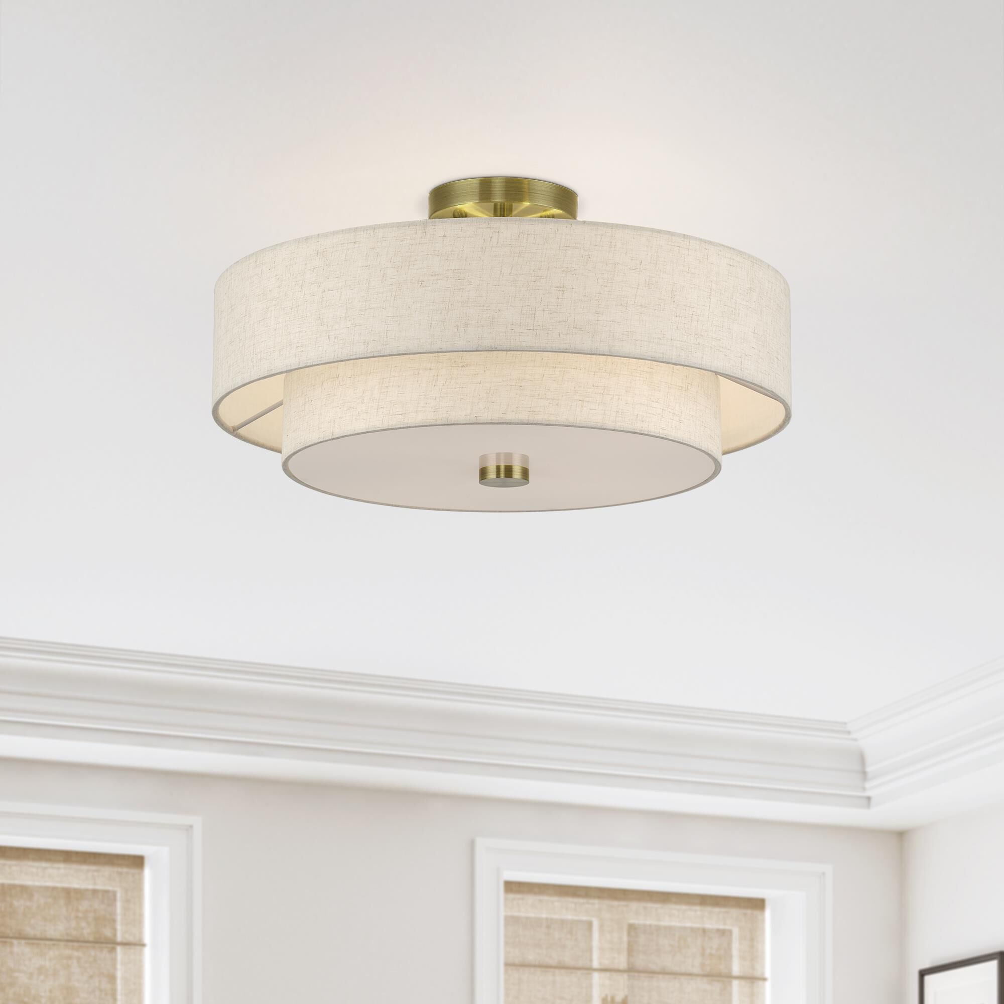 Shown in Antique Brass finish and Hand Crafted Oatmeal Color Fabric with White Color Inside shade