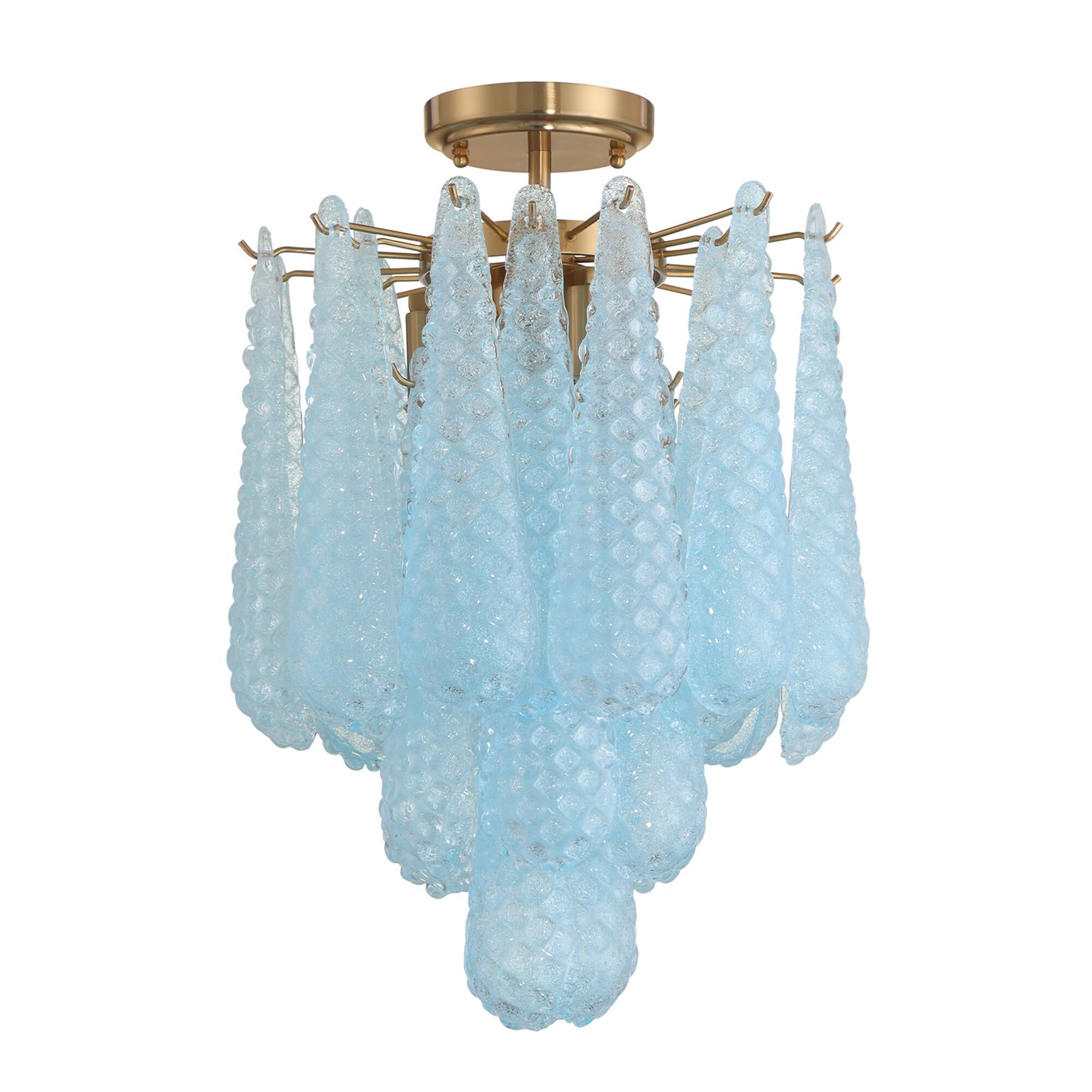 Shown in Aged Brass finish and Sand Blue glass