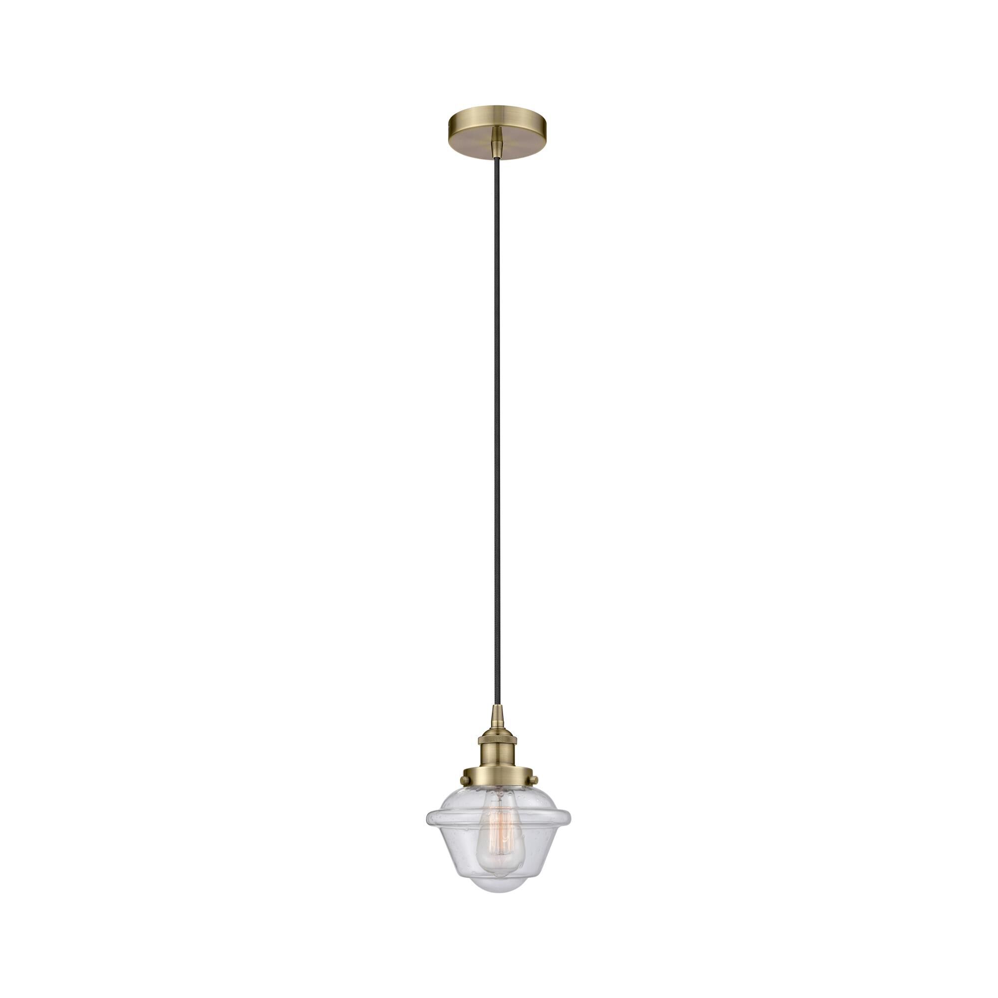 Shown in Antique Brass finish and Seedy Small Oxford glass