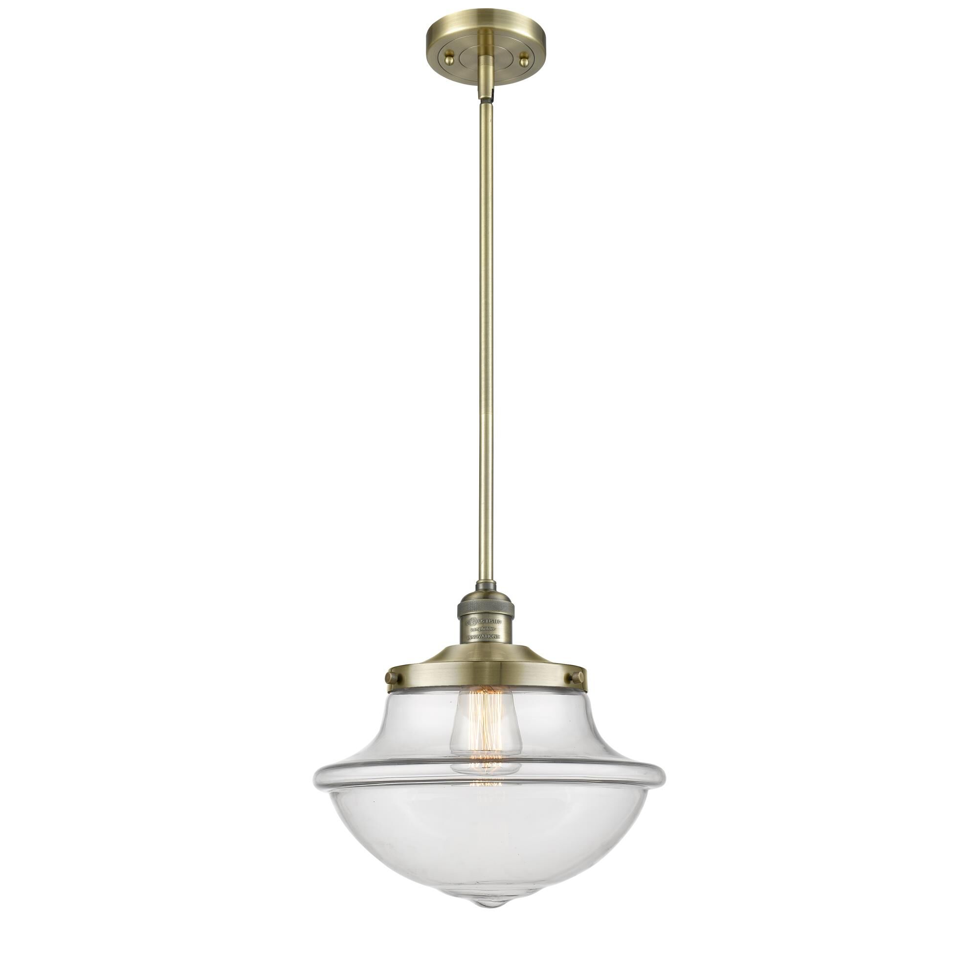 Shown in Antique Brass finish and Schoolhouse glass and Glass shade