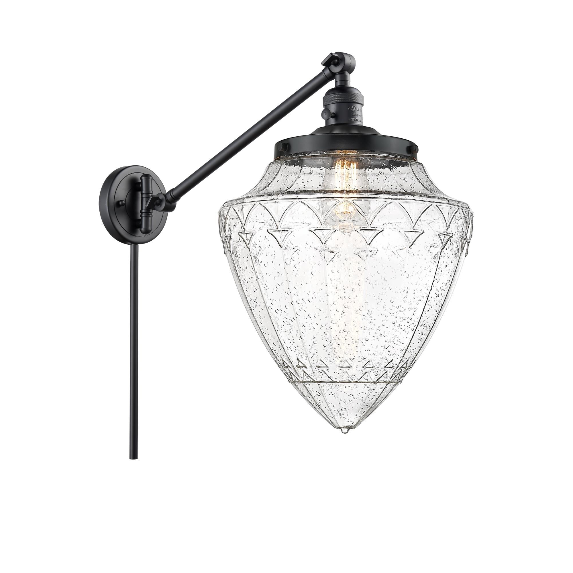 Shown in Matte Black finish and Seedy glass