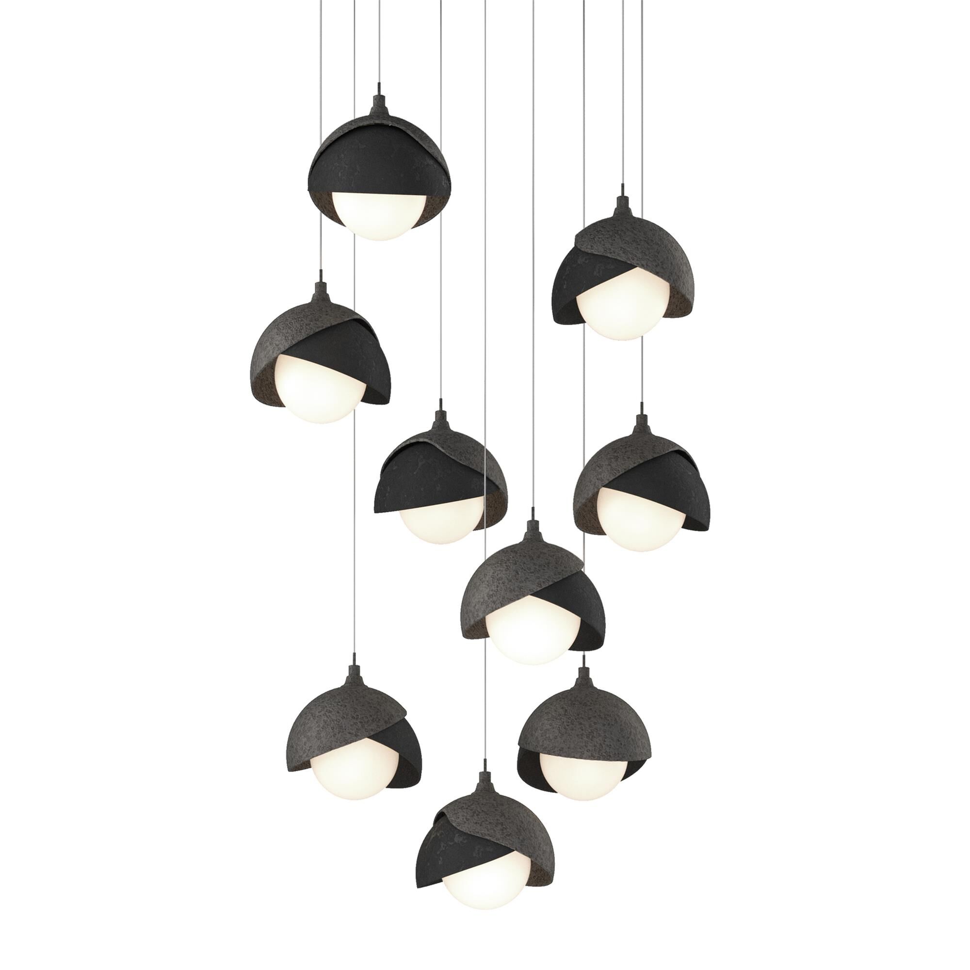 Shown in Natural Iron finish and Opal glass and Black accent