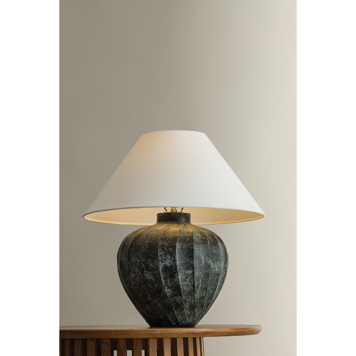 Shown in Patina Brass finish and Off White Linen shade