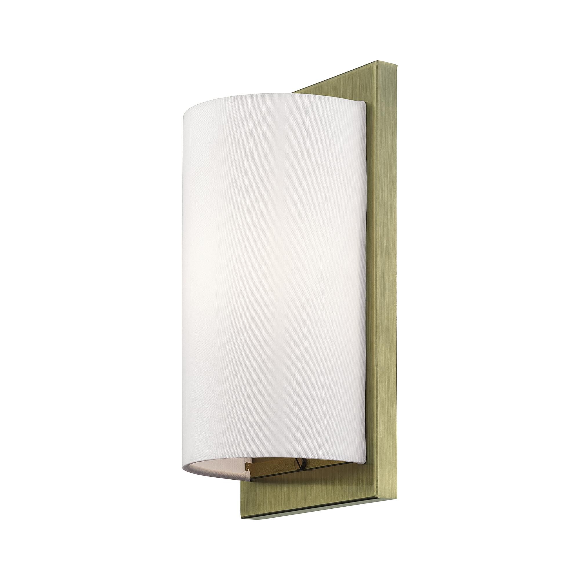 Shown in Antique Brass finish and Hand Crafted Off-White Fabric Hardback shade