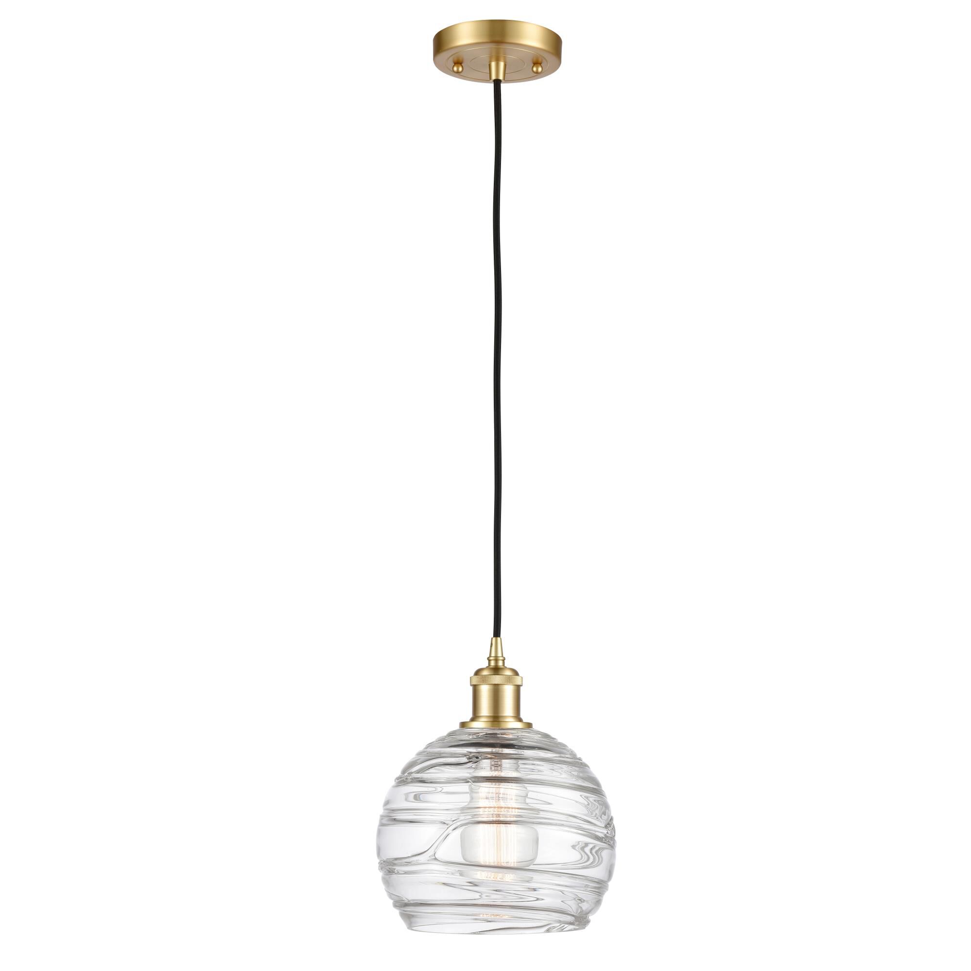 Shown in Satin Gold finish and Clear Deco Swirl glass