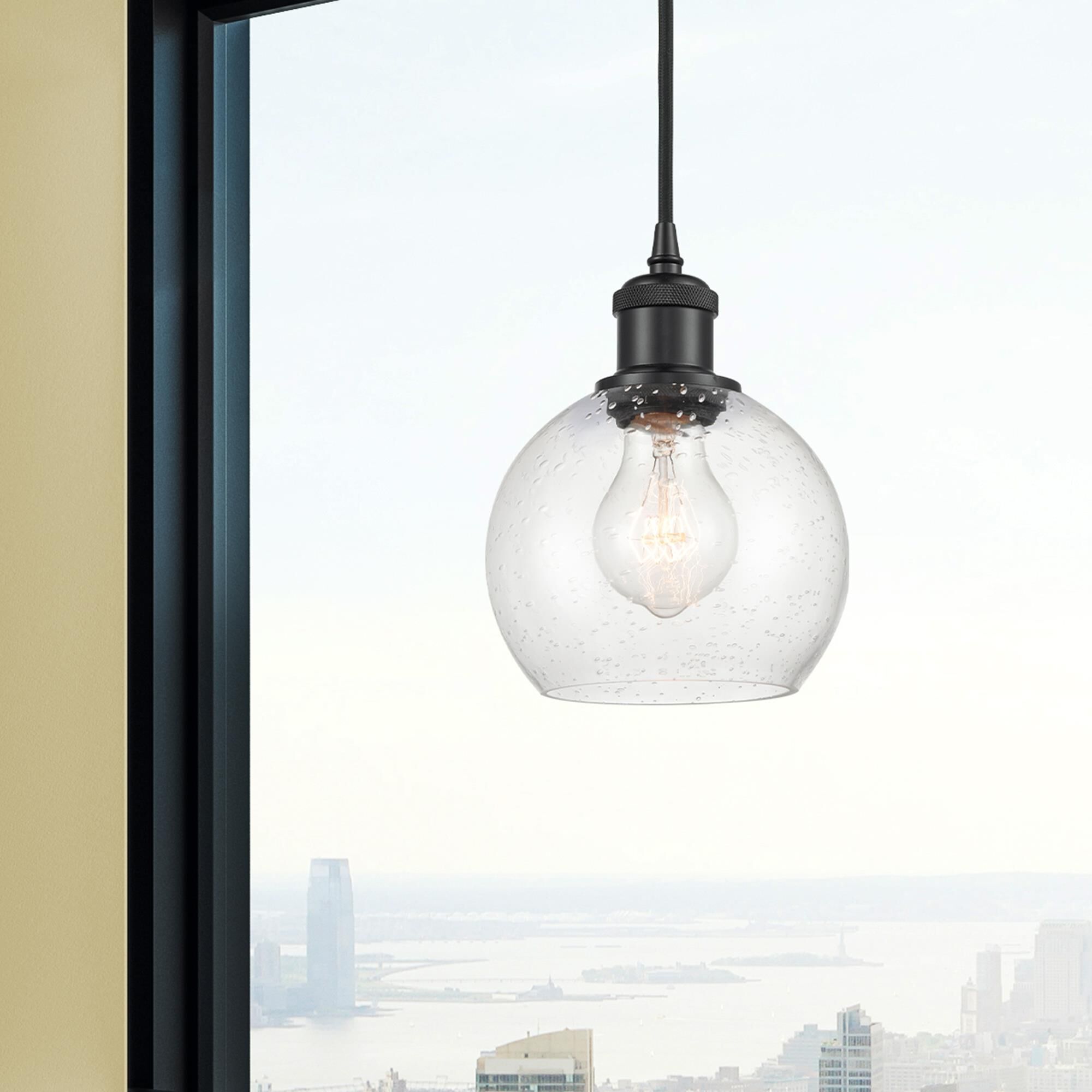 Shown in Matte Black finish and Seedy glass