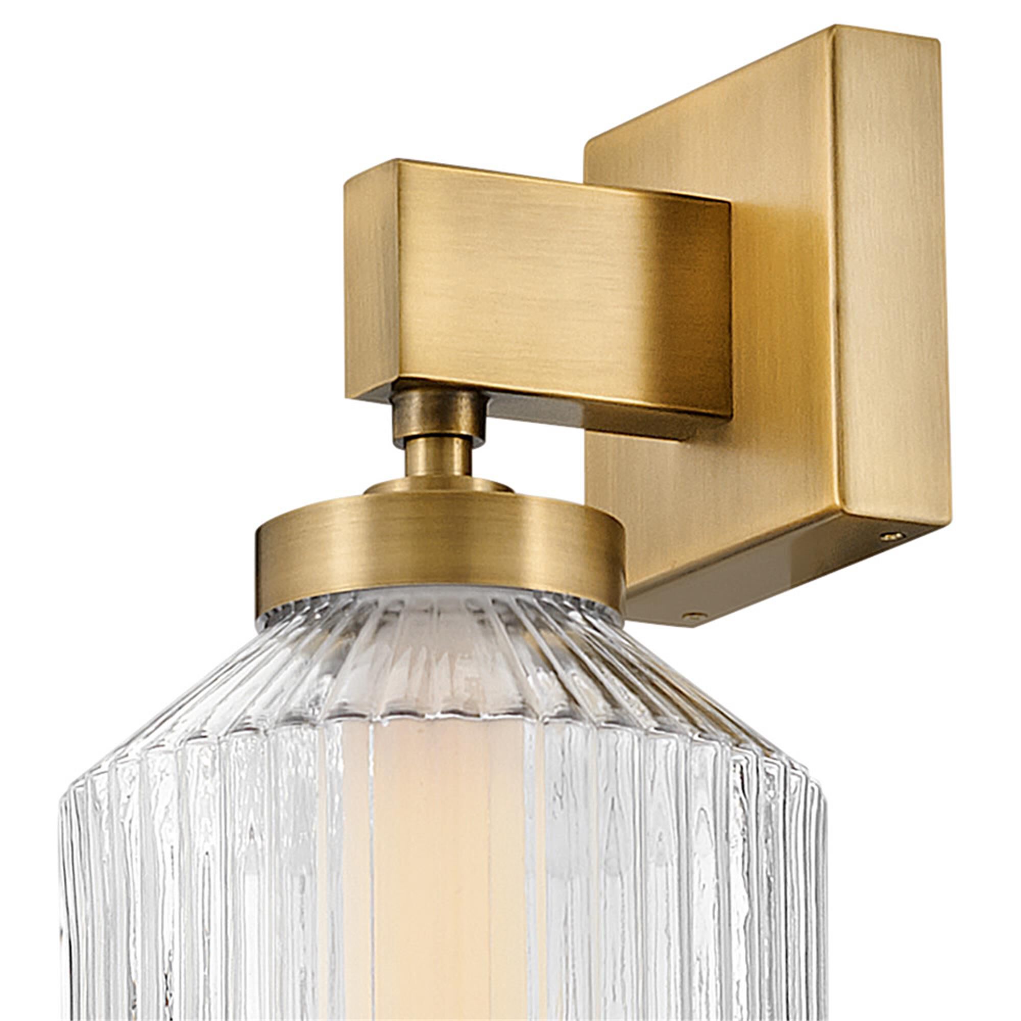 Shown in Lacquered Brass finish and Clear Ribbed glass