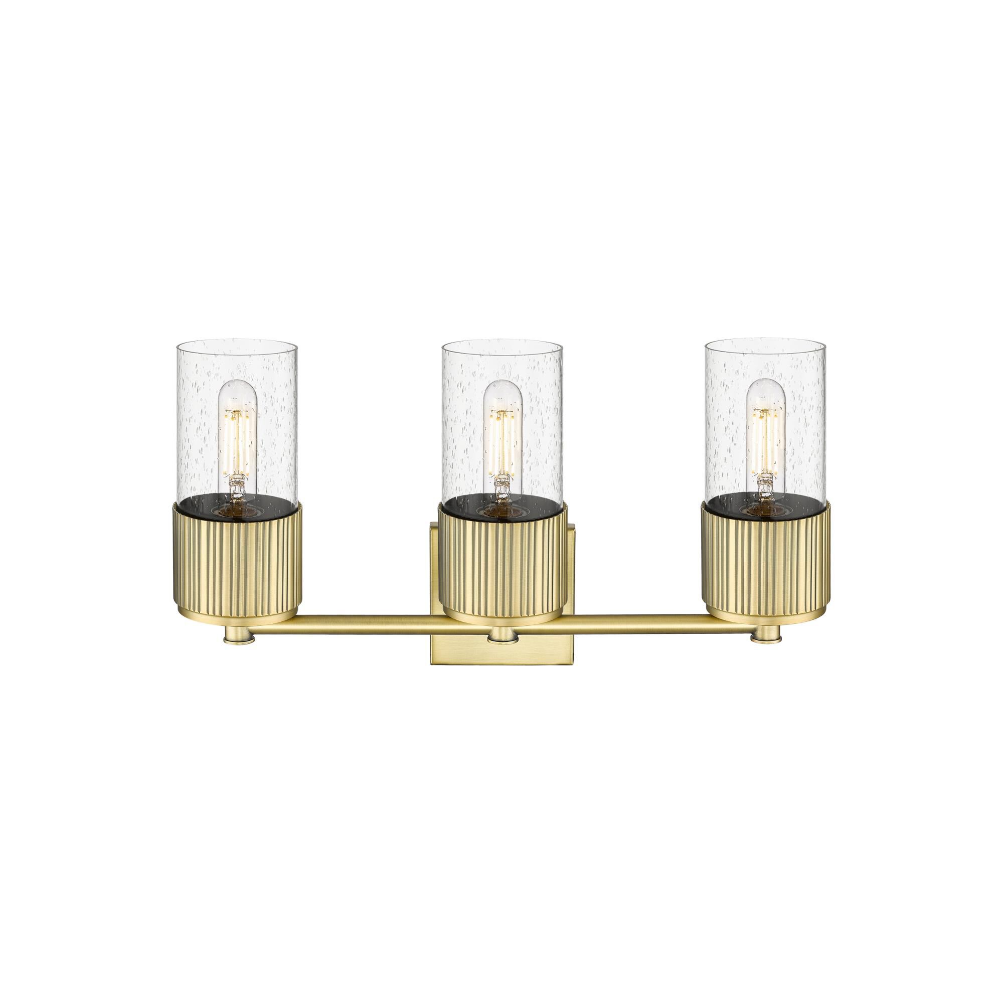 Shown in Brushed Brass finish and Seedy glass