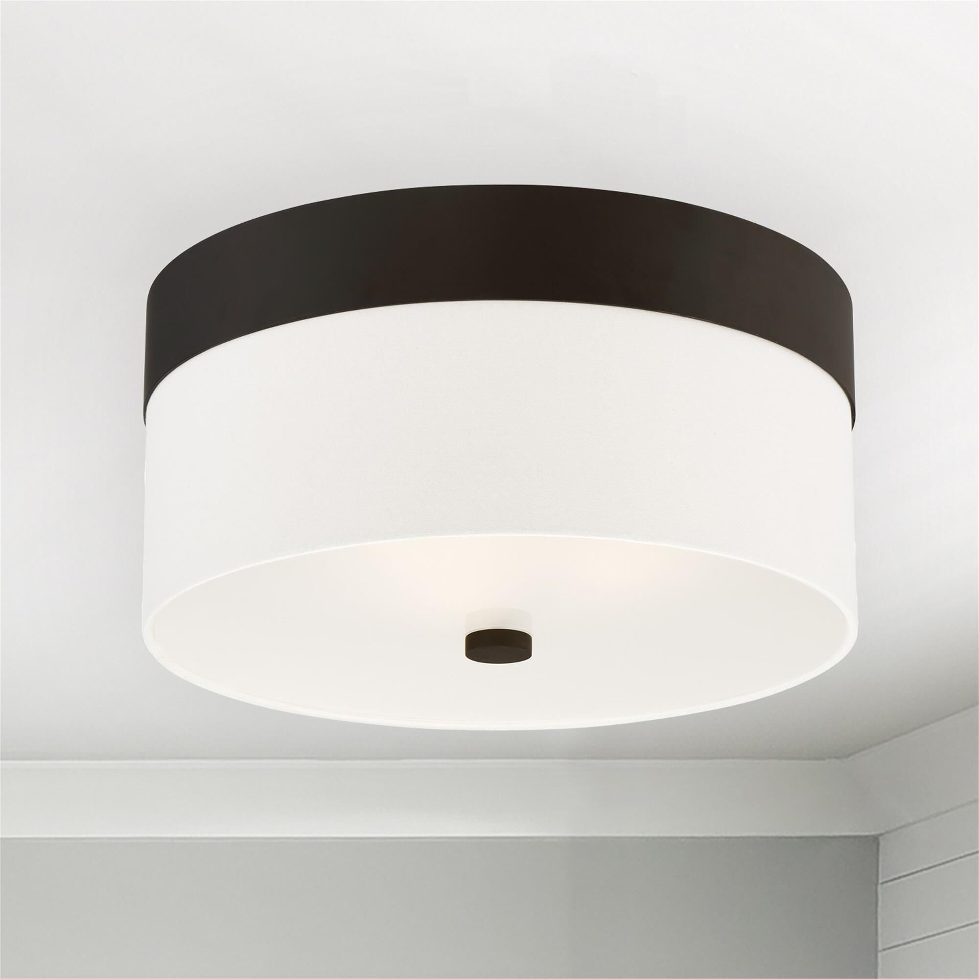 Shown in Dark Bronze finish and Silk glass and Cream shade