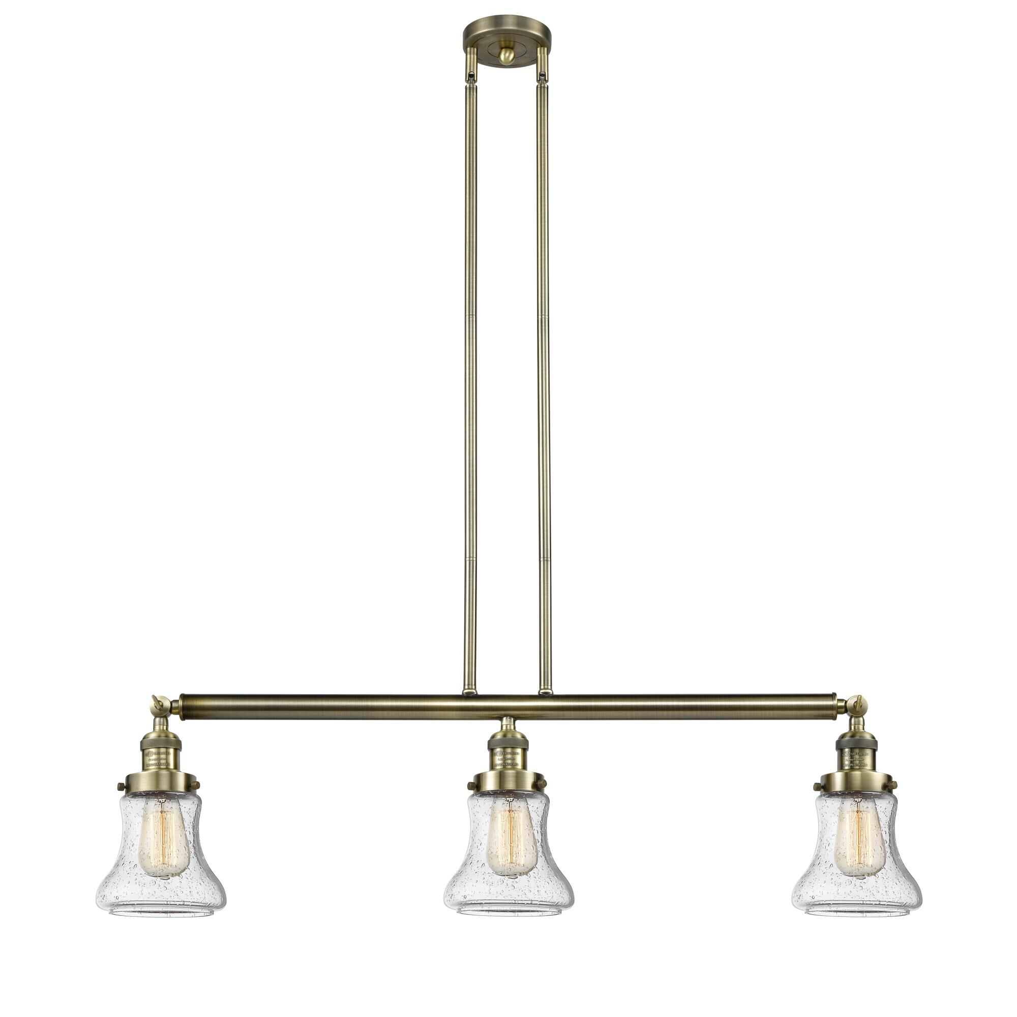 Shown in Antique Brass finish and Seedy glass
