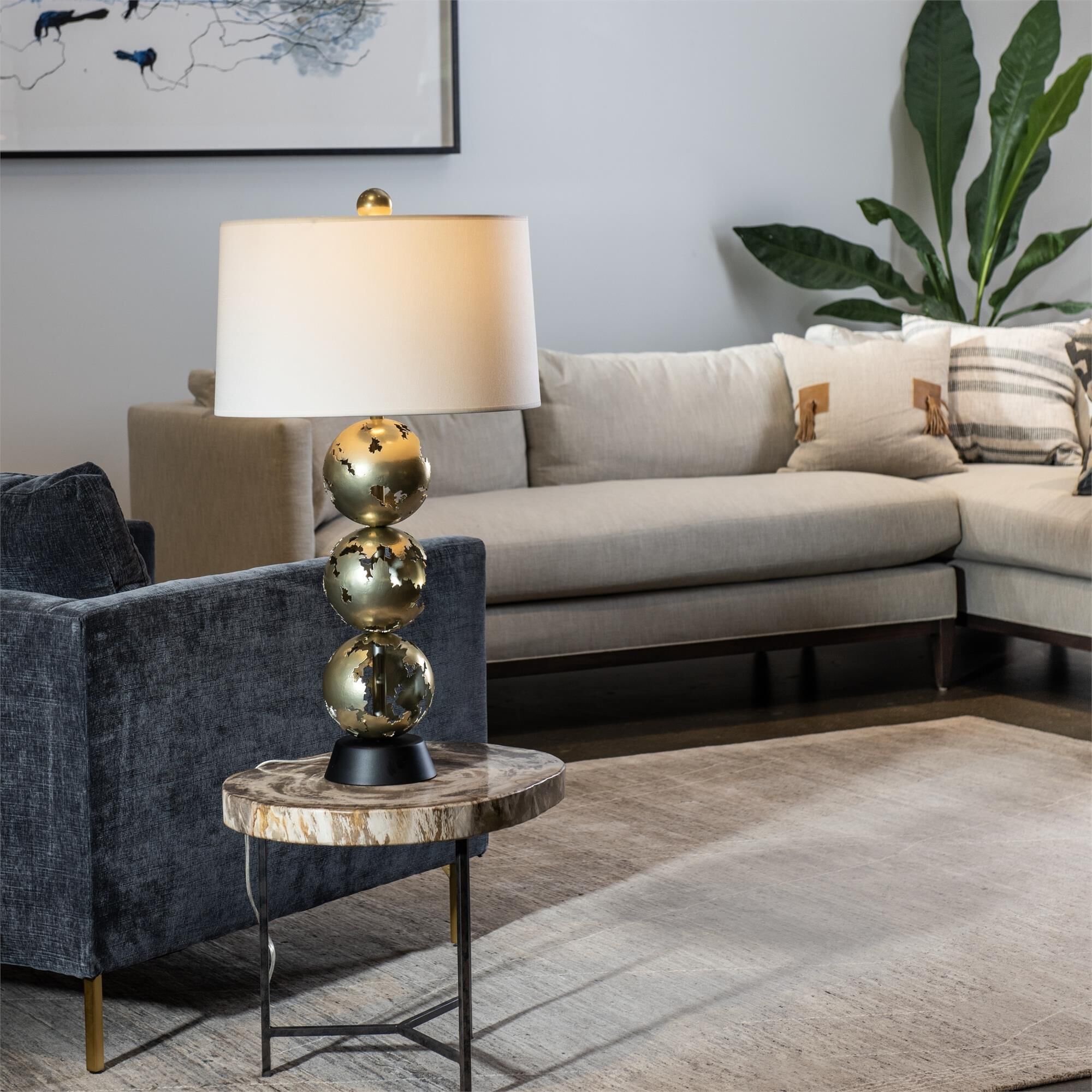 Shown in Modern Brass and Black finish and Natural Anna shade