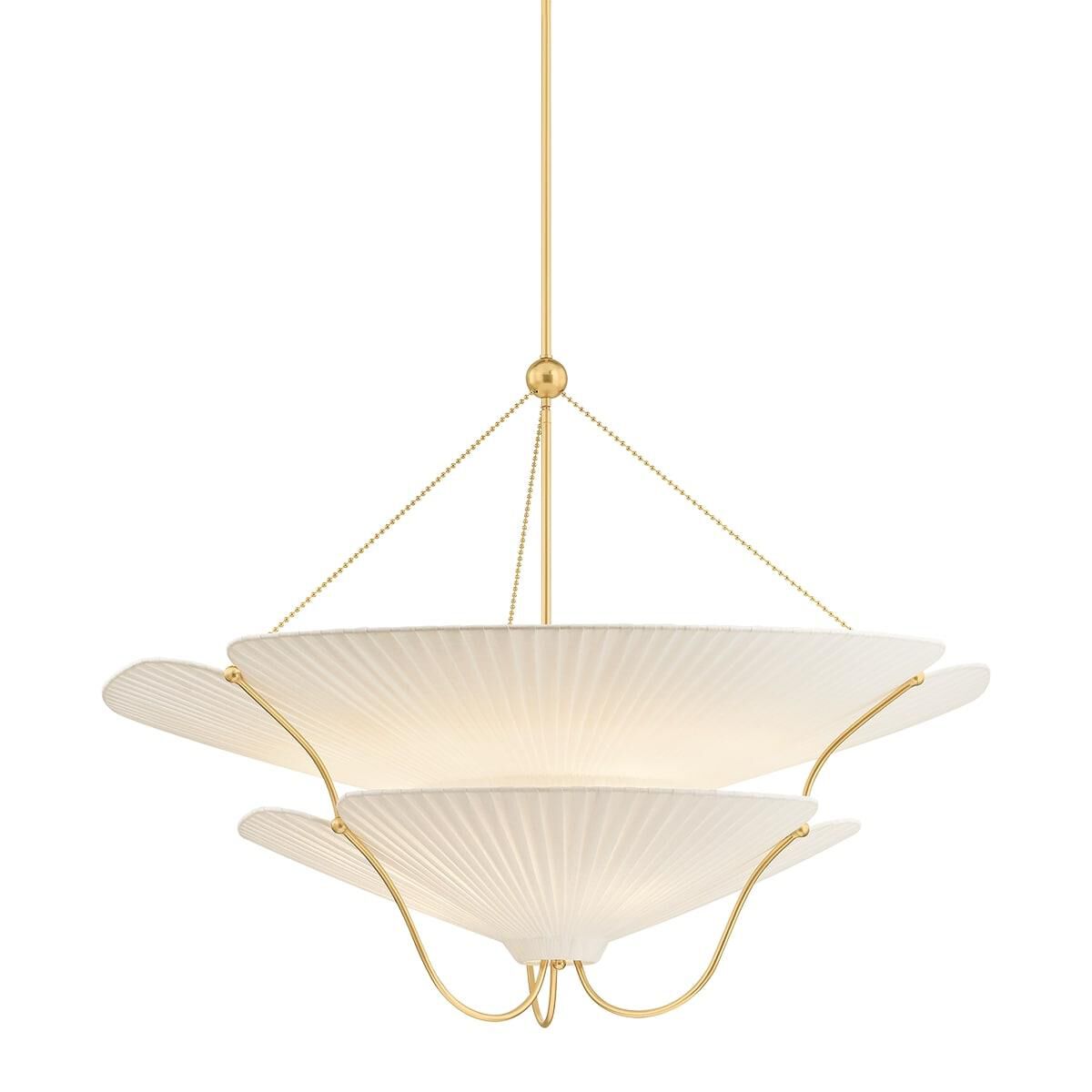 Shown in Aged Brass finish and Ivory Linen shade