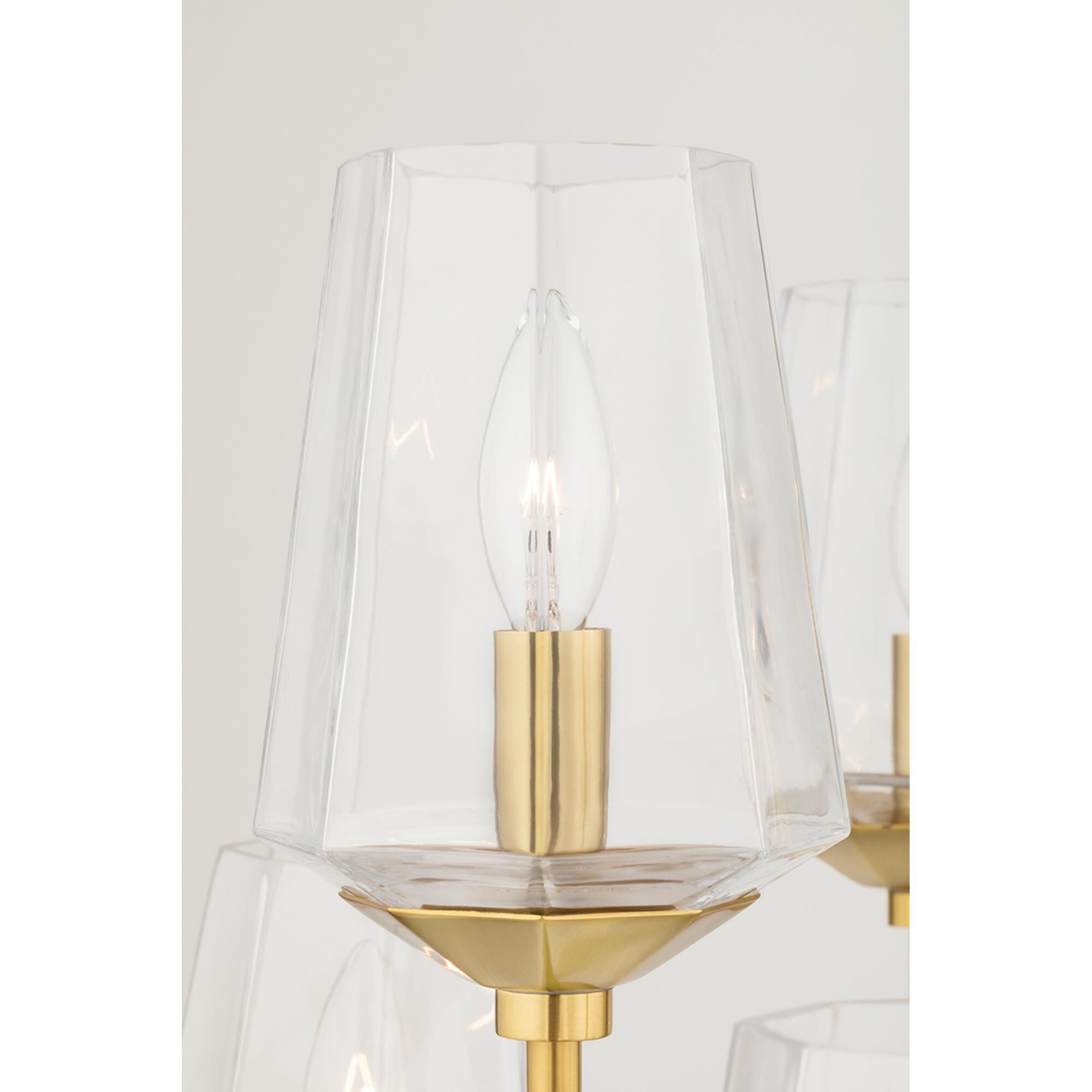 Shown in Aged Brass finish and Clear glass